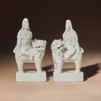 A Matched Pair of Chinese Blanc-de-Chine Figural Groups of Bodhisattva Manjushri Sitting on Fu Lion, Late 17th Century — 清早期 德化白瓷文殊菩薩一對