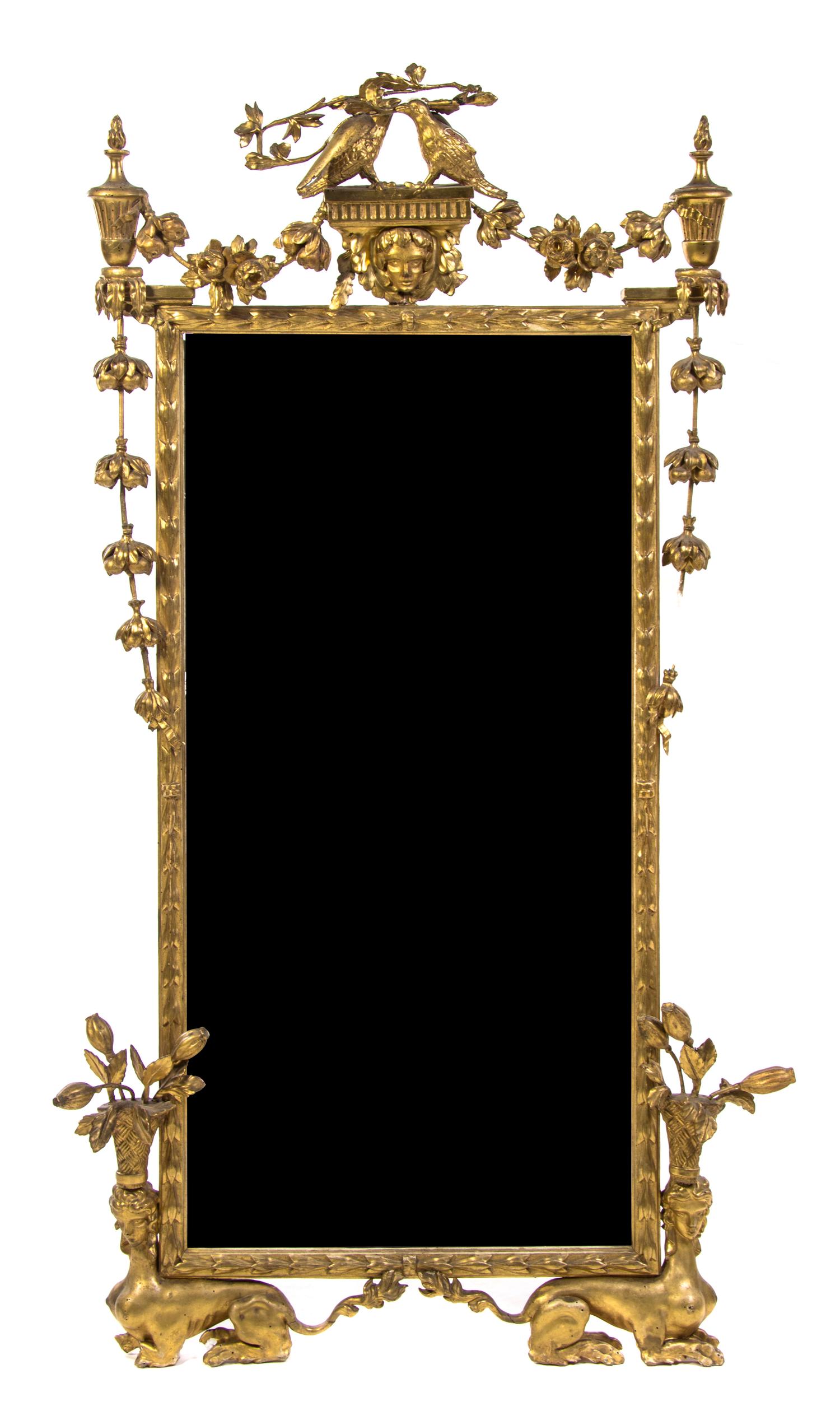 An Italian Neoclassical Giltwood Mirror, Height 69 x width 34 inches.