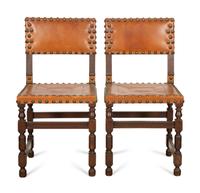 A Pair of Oak and Leather Side Chairs