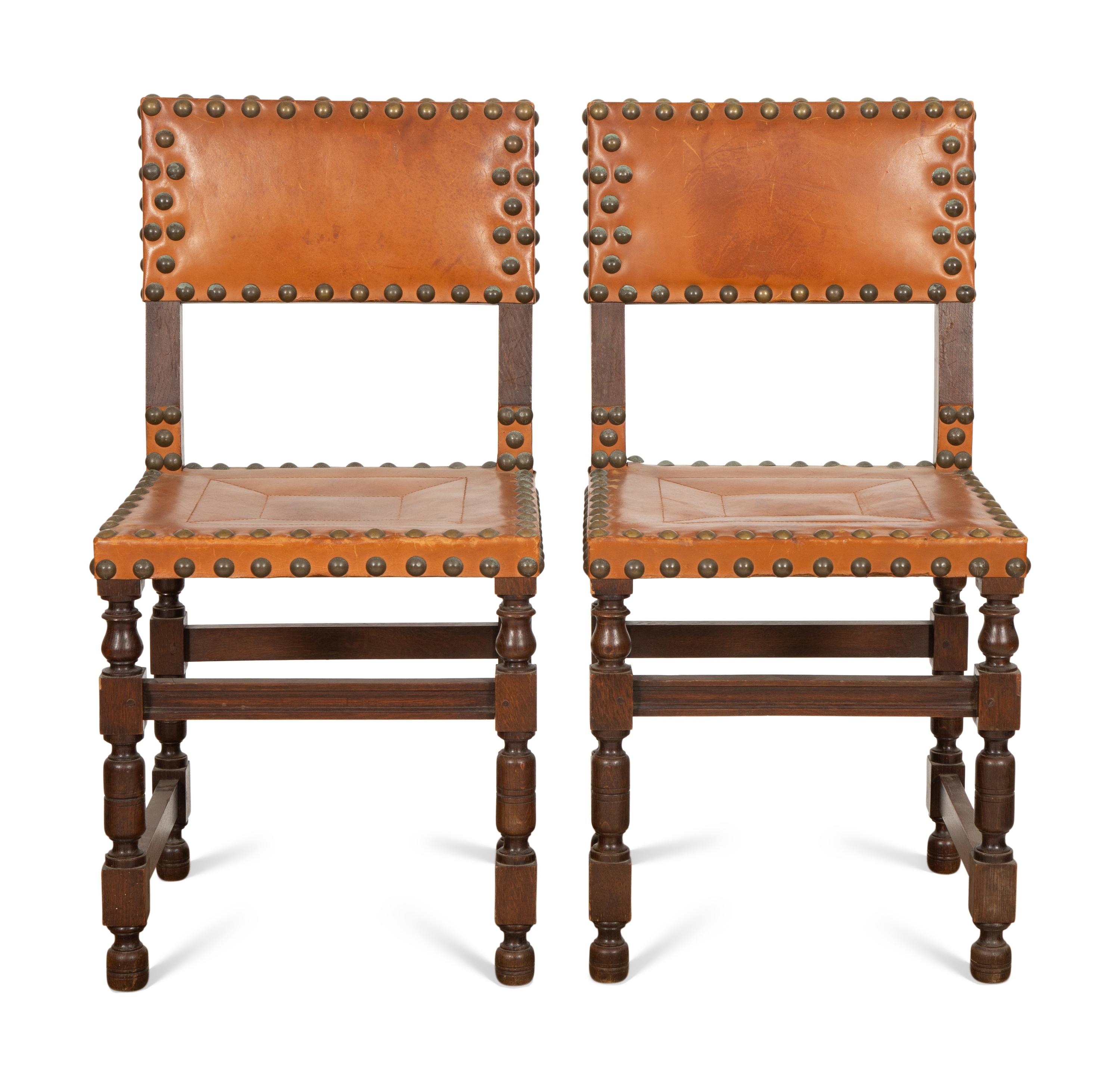 A Pair of Oak and Leather Side Chairs