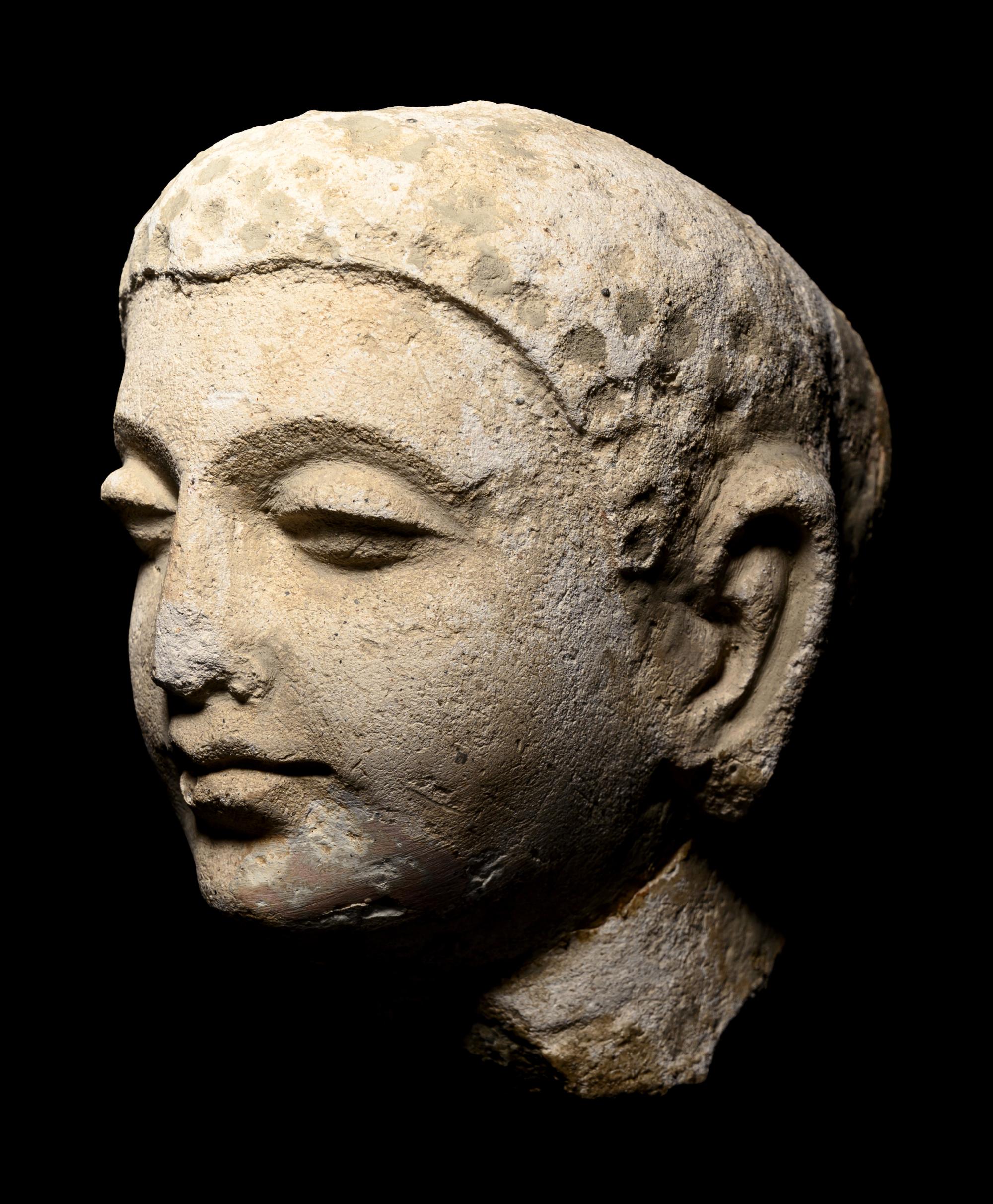 Four Gandharan Stucco Fragmented Heads