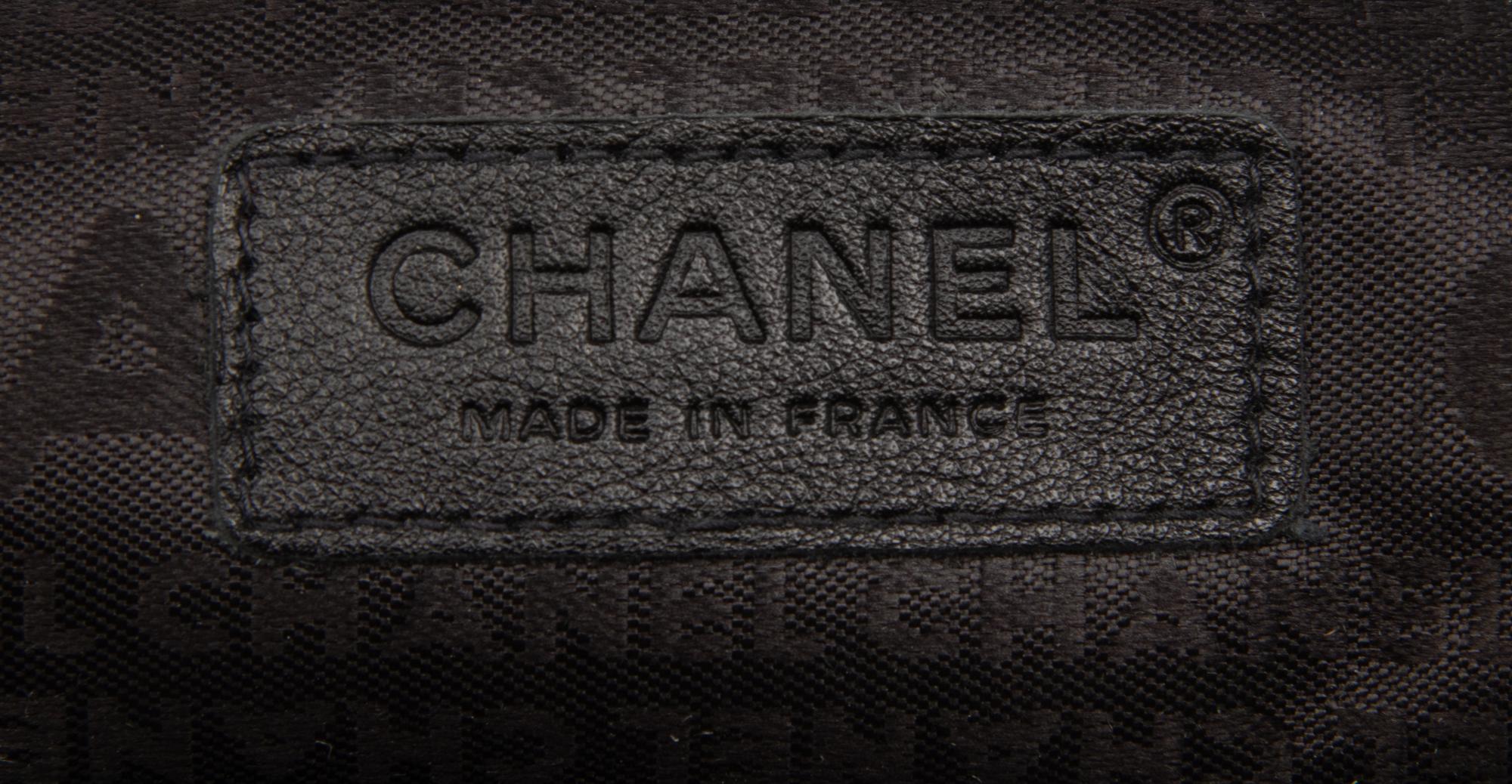 CHANEL, ACCORDION PUSH-LOCK FLAP BAG