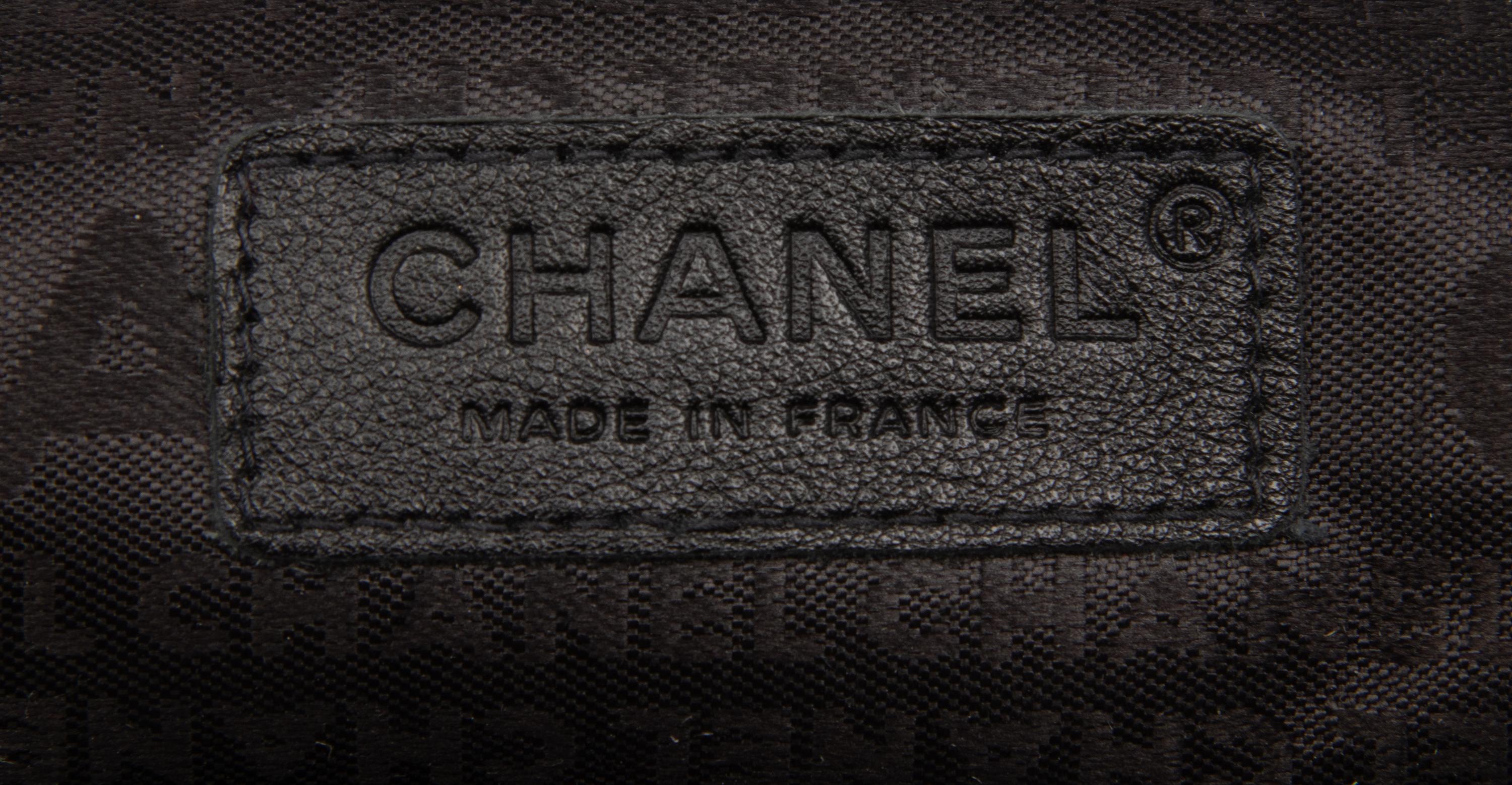 CHANEL, ACCORDION PUSH-LOCK FLAP BAG