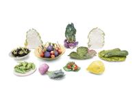 A Collection of Eleven Assorted Ceramic Fruit and Vegetable Articles in the Style of Eva Gordon