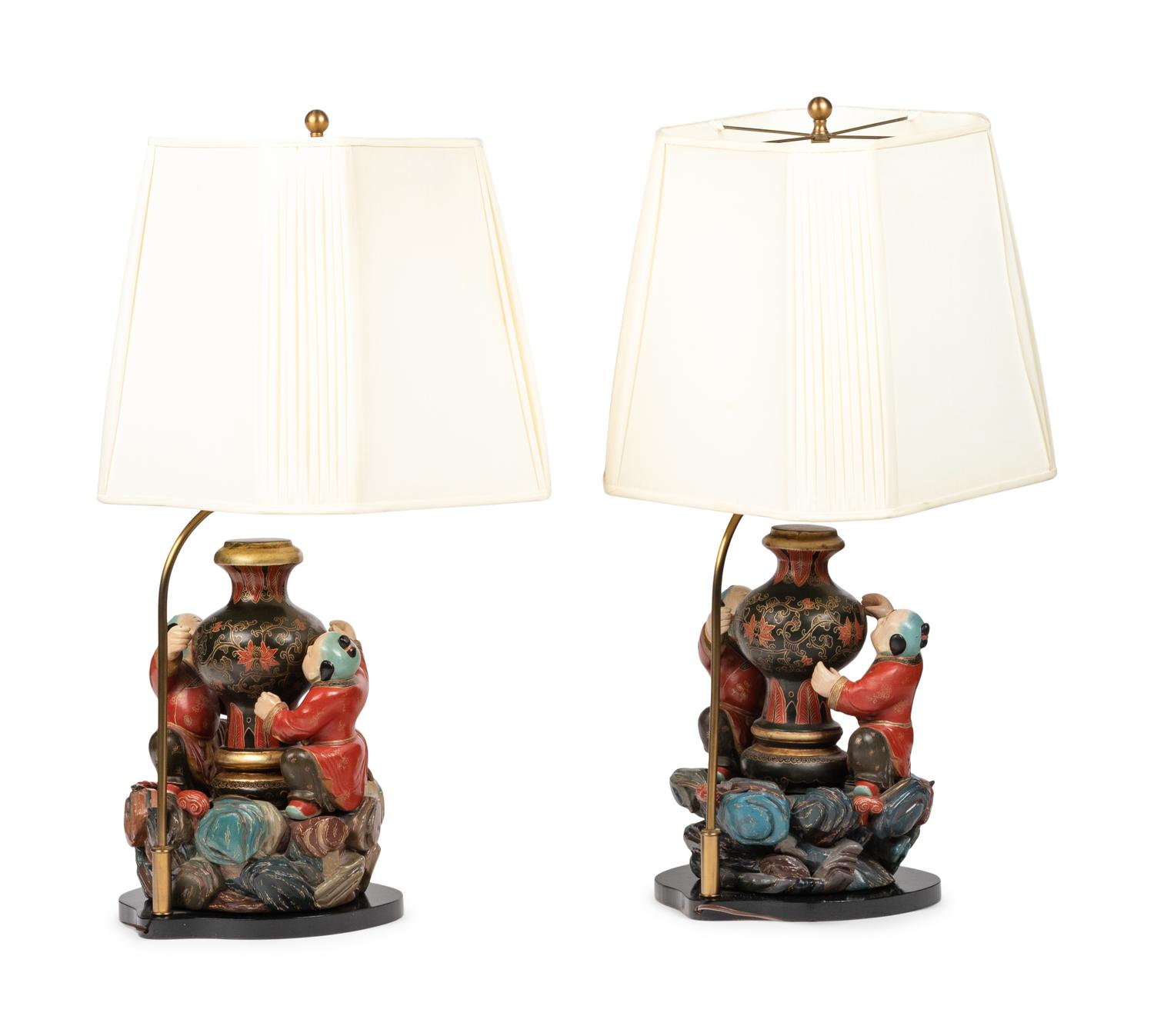 A Pair of Chinese Carved Wood Figural Lamps