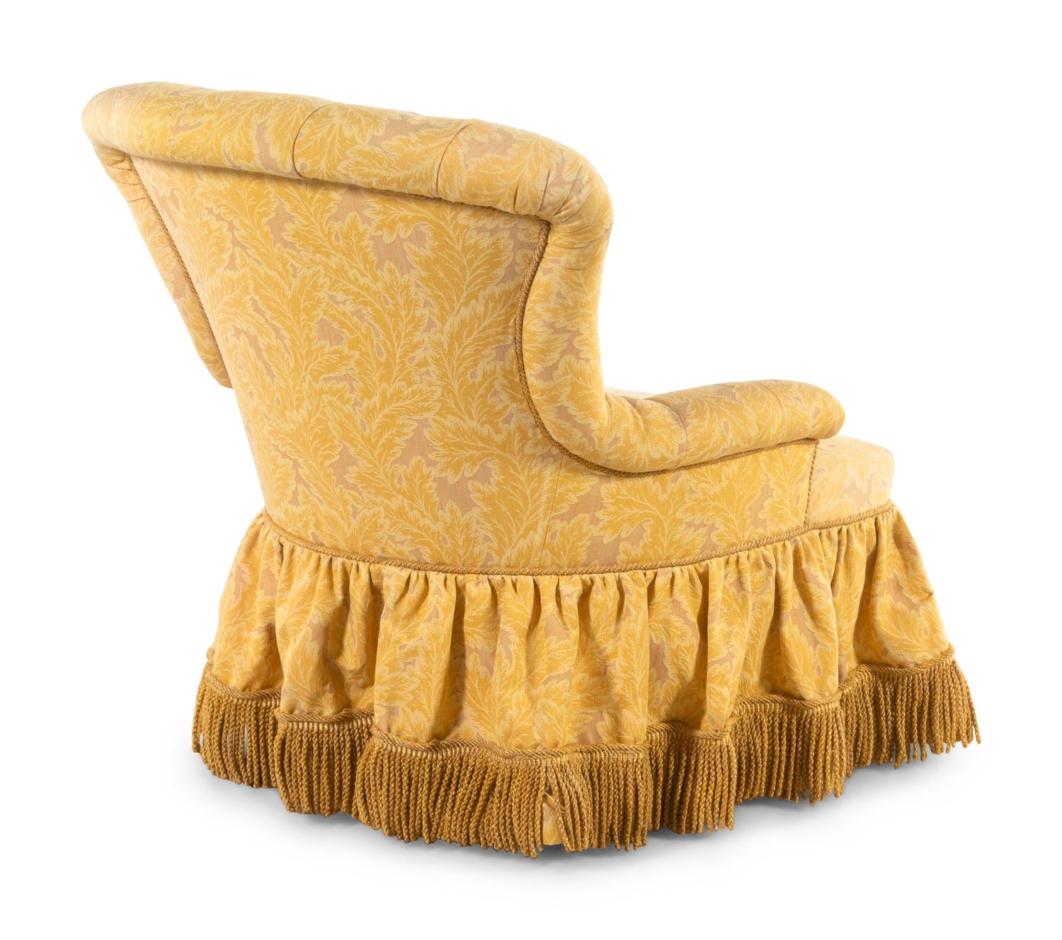 A Custom Button-Tufted Upholstered Armchair with Bullion Fringe