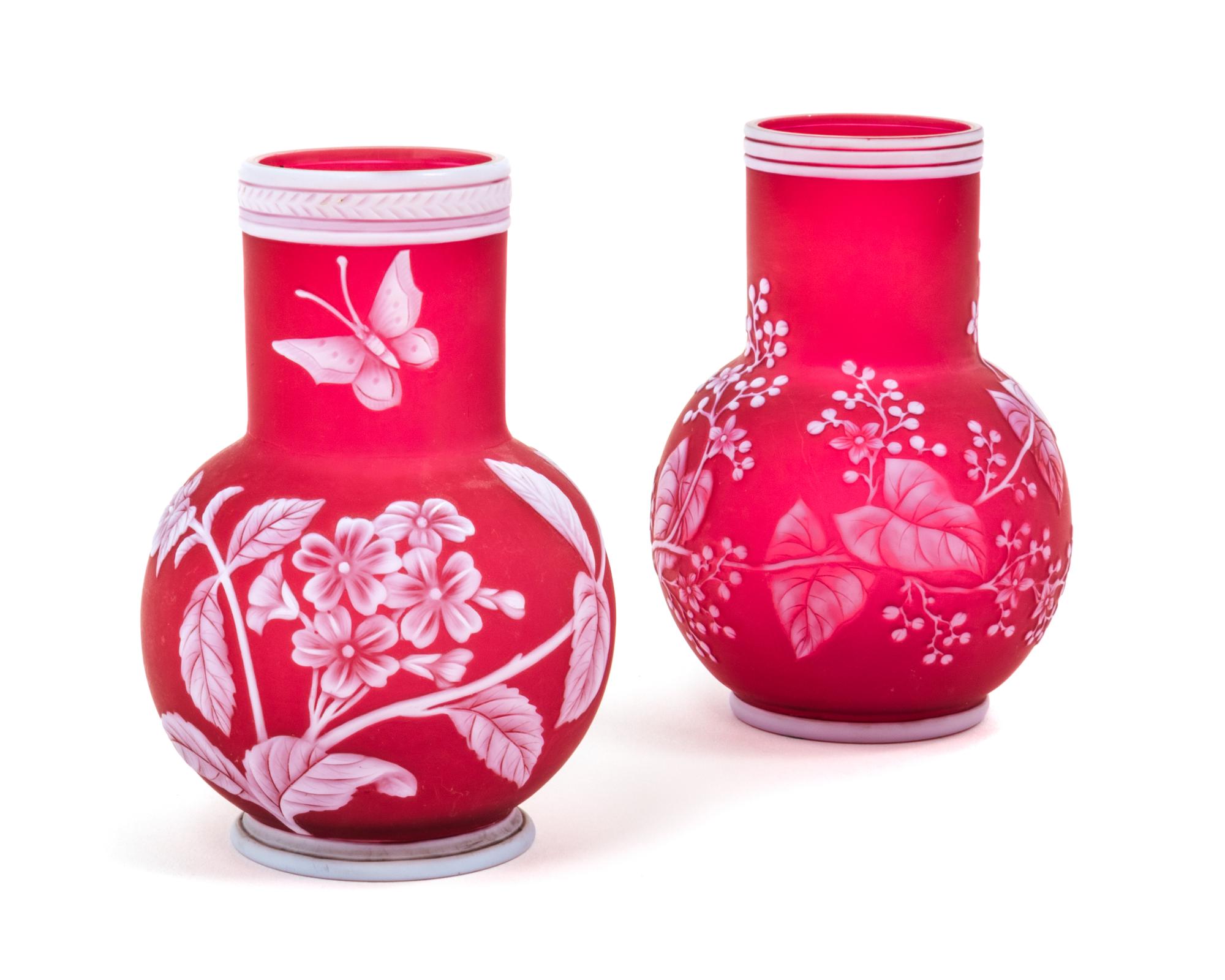English, LATE 19TH CENTURY, two cameo glass vases, each of bottle form with foliate decoration, one additionally decorated with butterf