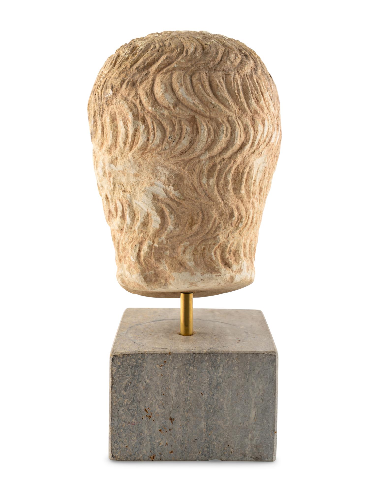 A Roman Stone Head of a Man