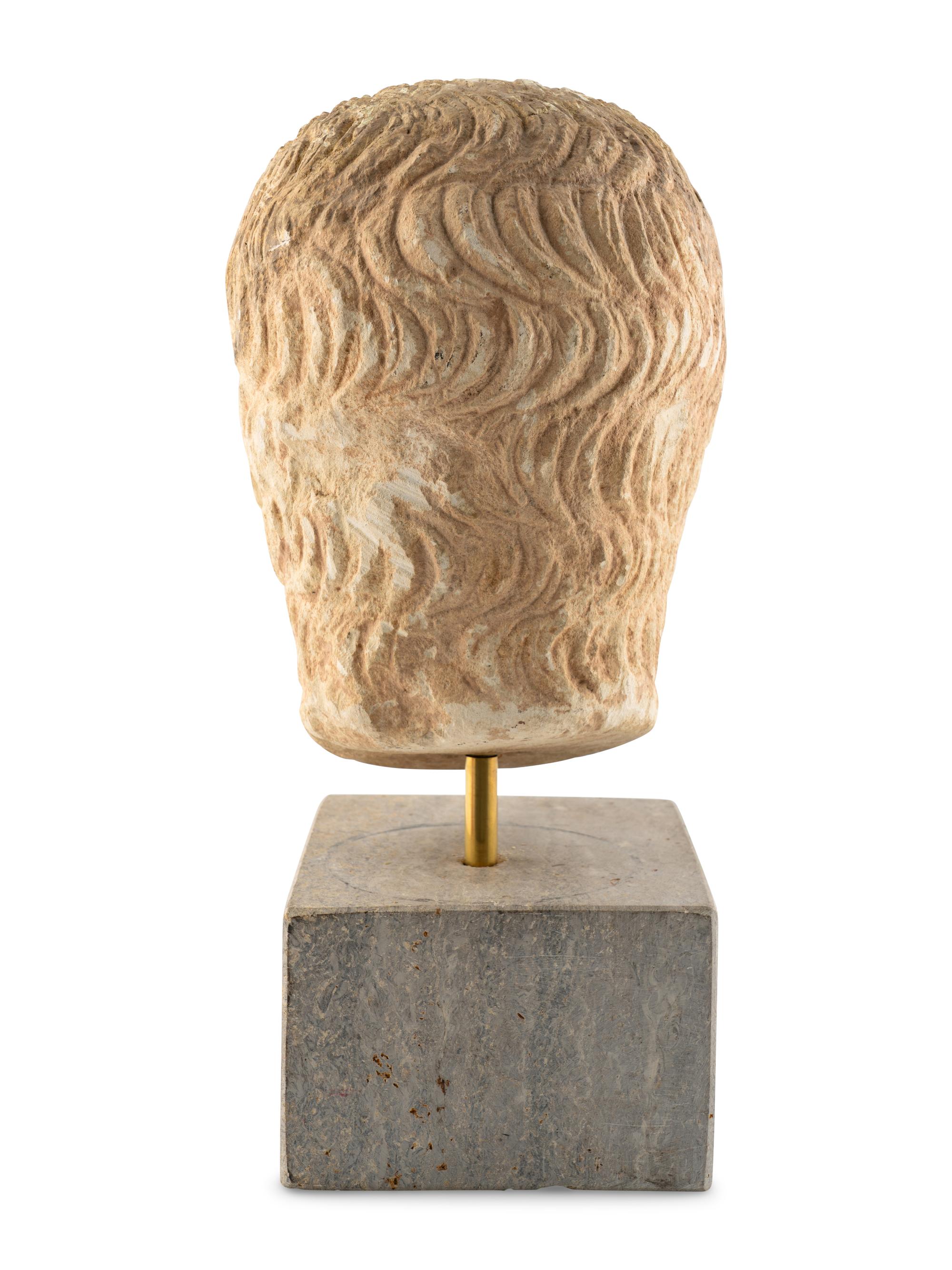 A Roman Stone Head of a Man
