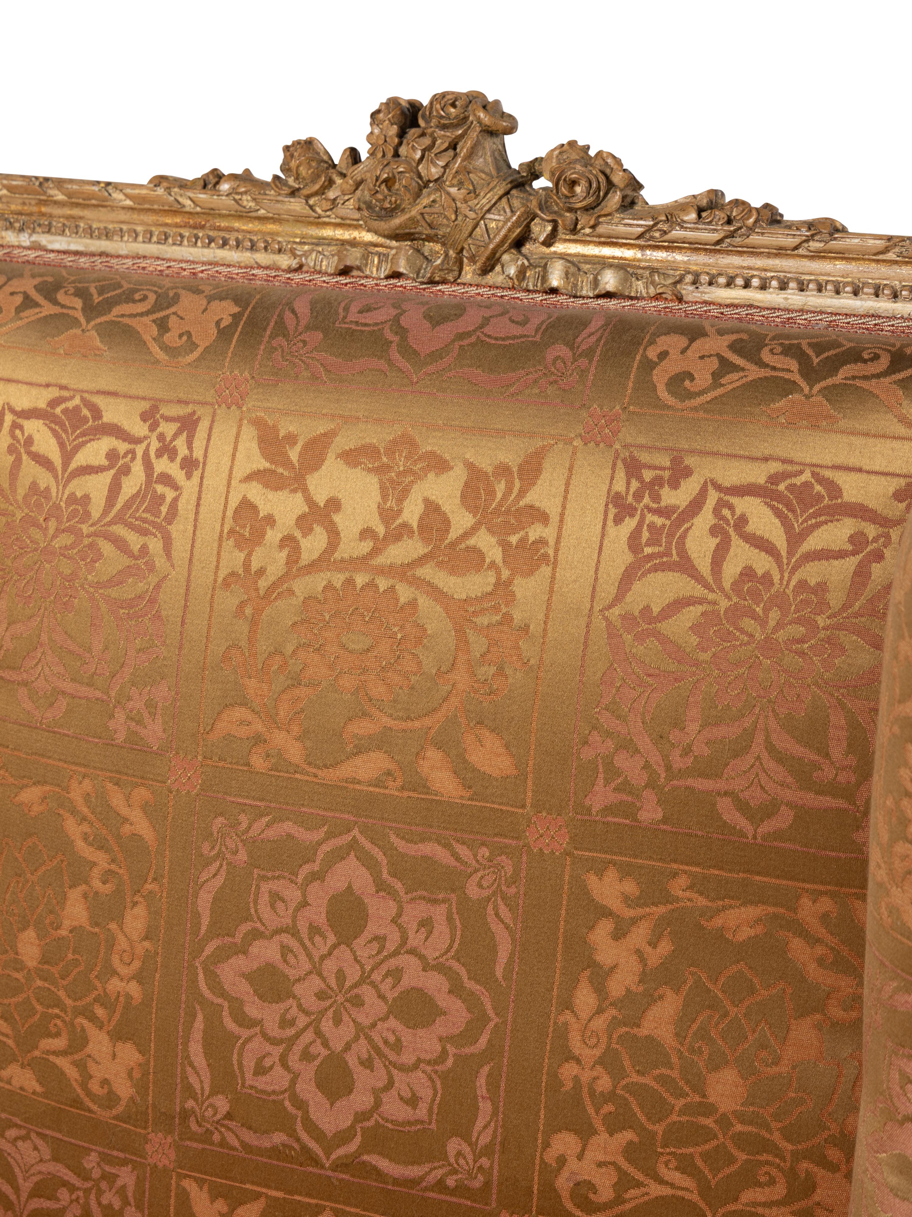 A Pair of Louis XVI Carved Giltwood Bergères