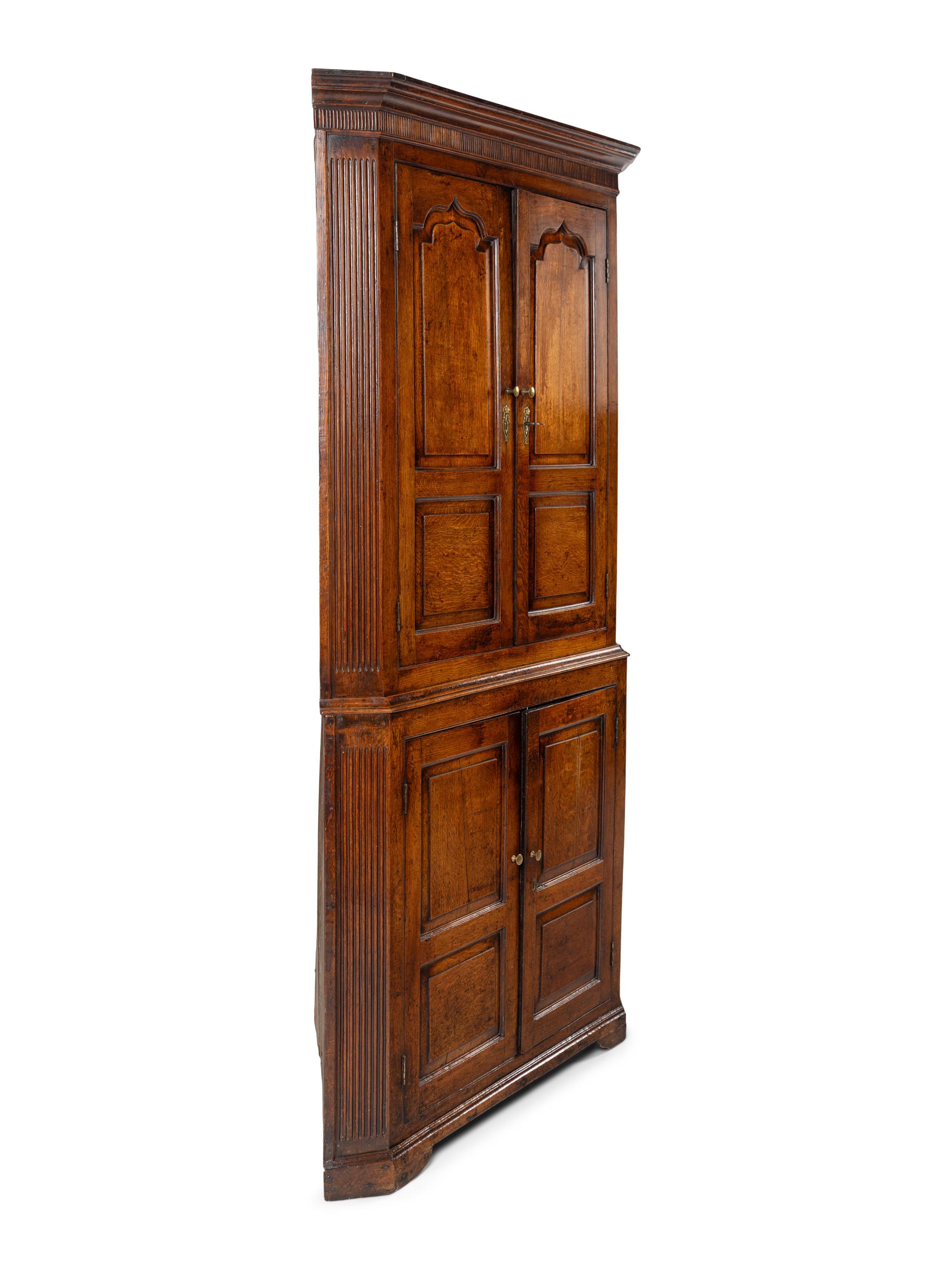 A George III Oak Corner Cabinet