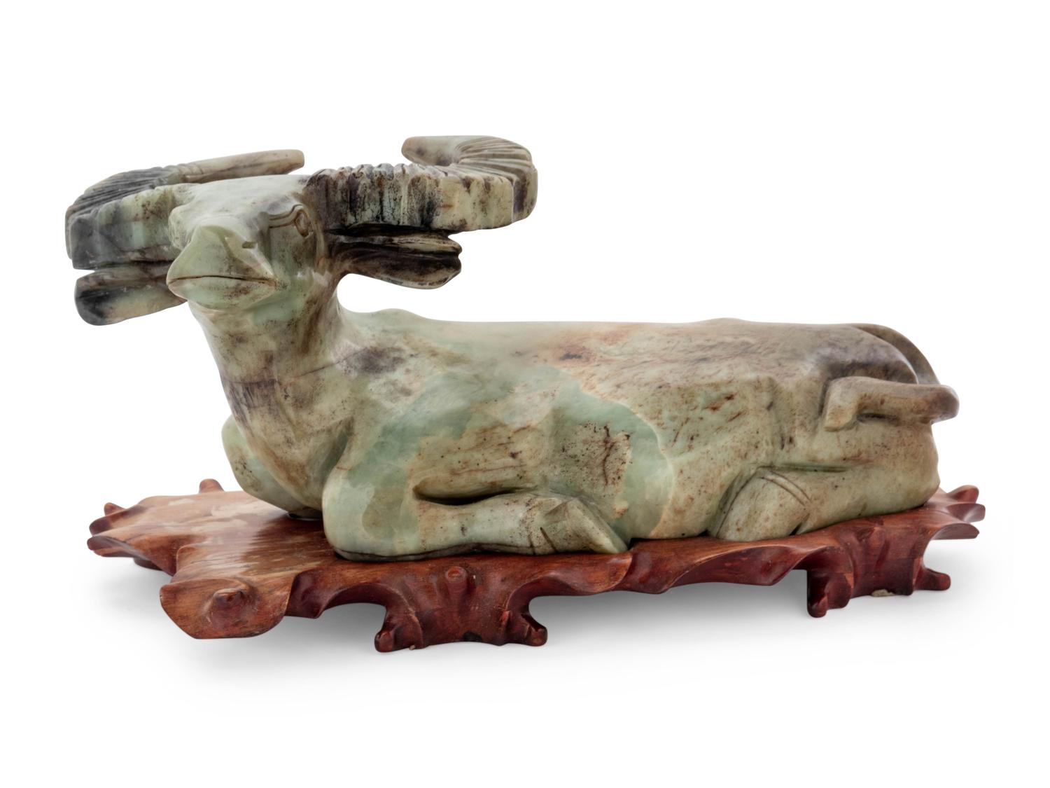 A Chinese Export Carved Hardstone Model of a Bull — 20TH CENTURY