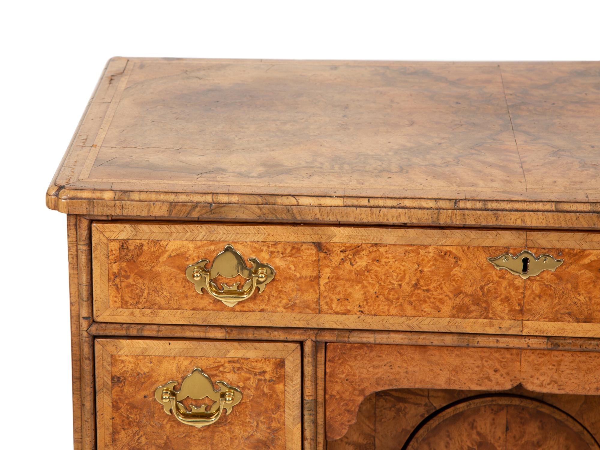 A George II Style Yew and Walnut Kneehole Desk