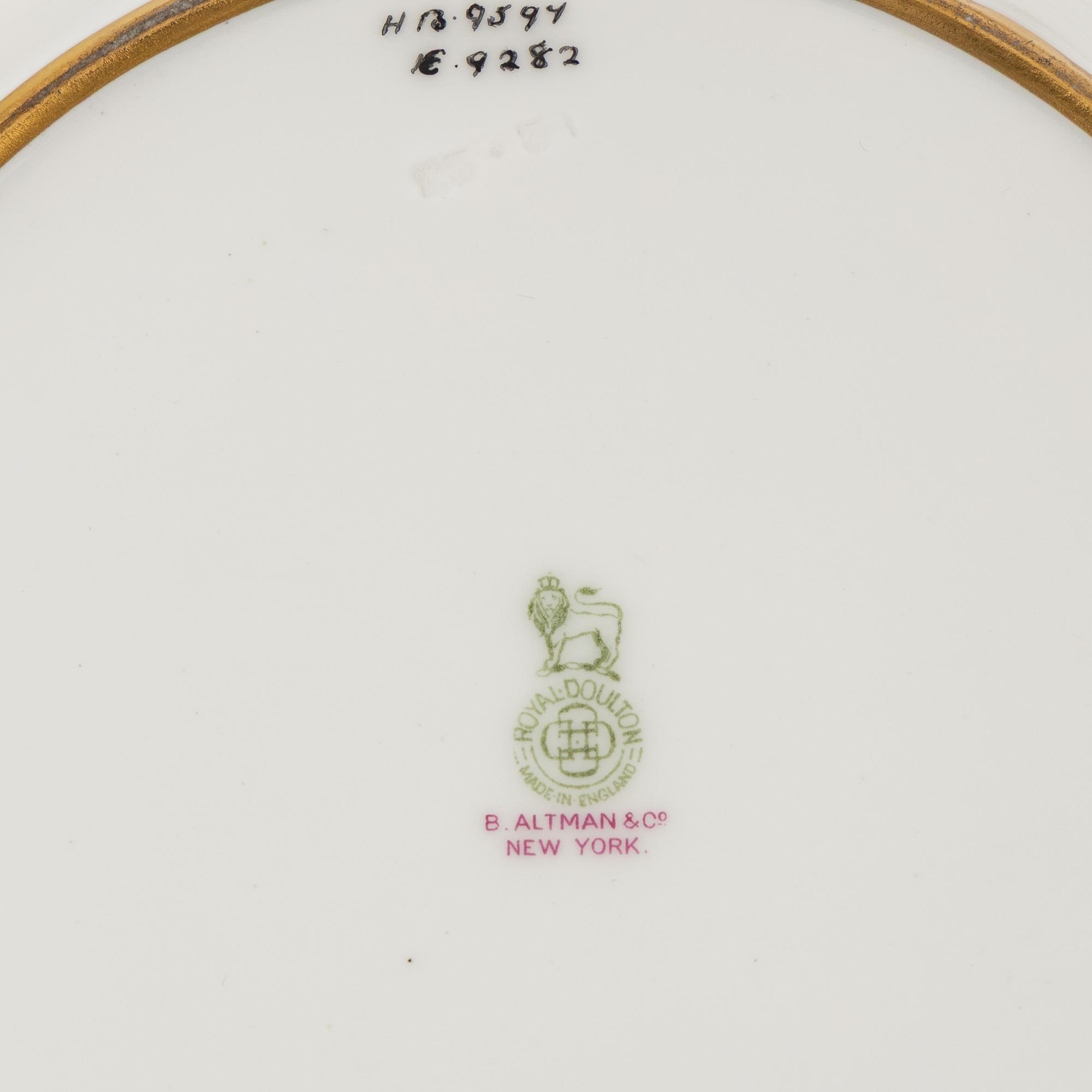 A Set of Ten Royal Doulton Gilt Decorated Porcelain Service Plates