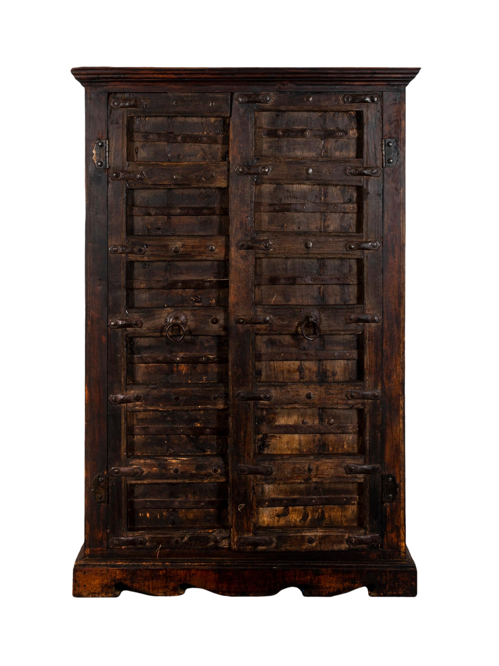 A Continental Iron Mounted Oak Two Door Cabinet — 19TH CENTURY