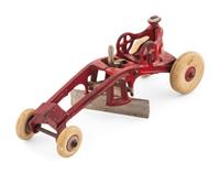A Kenton Cast Iron Road Grader and Jaeger Cement Mixer