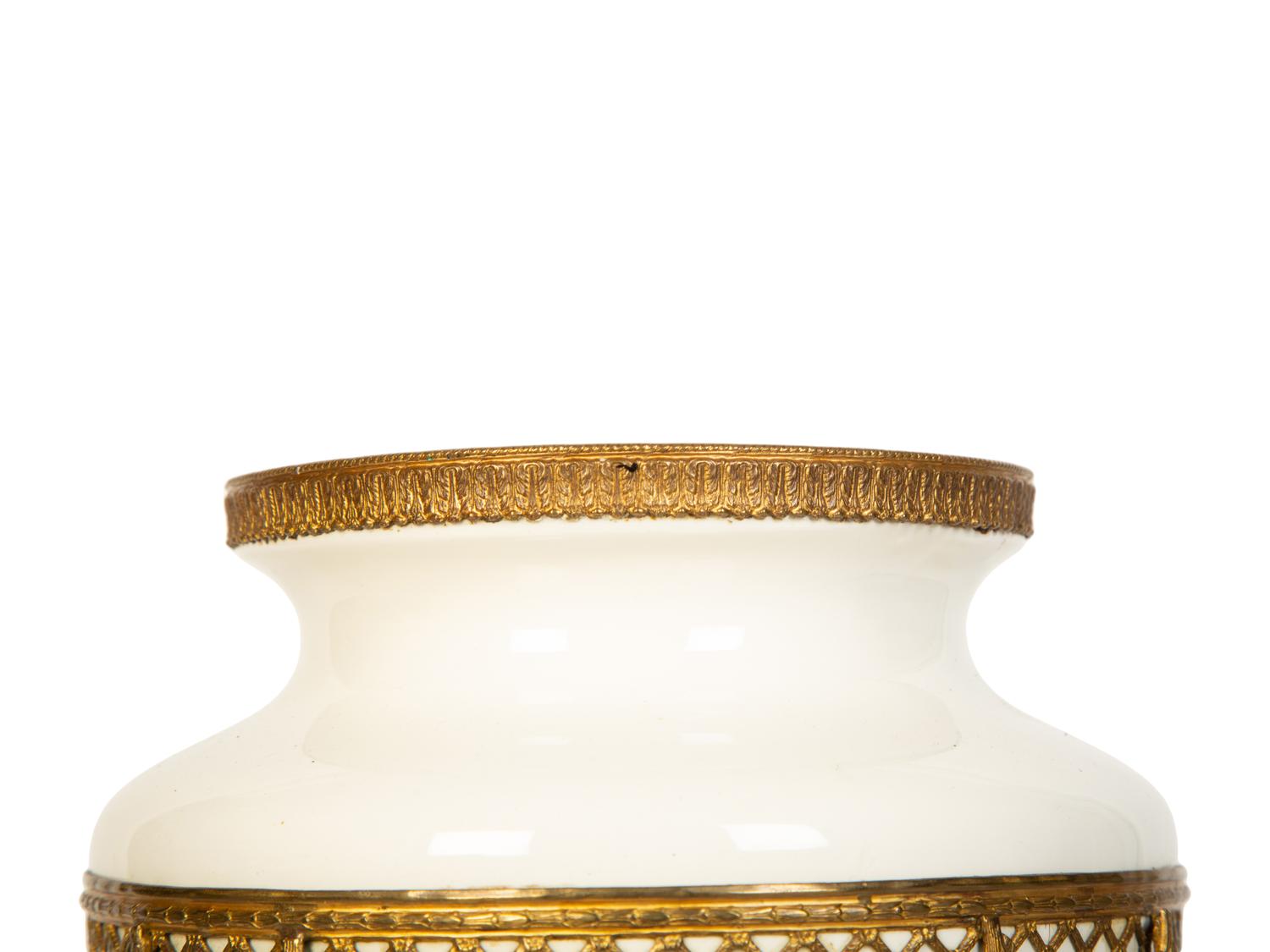 A Continental Gilt Metal Mounted Porcelain Vase