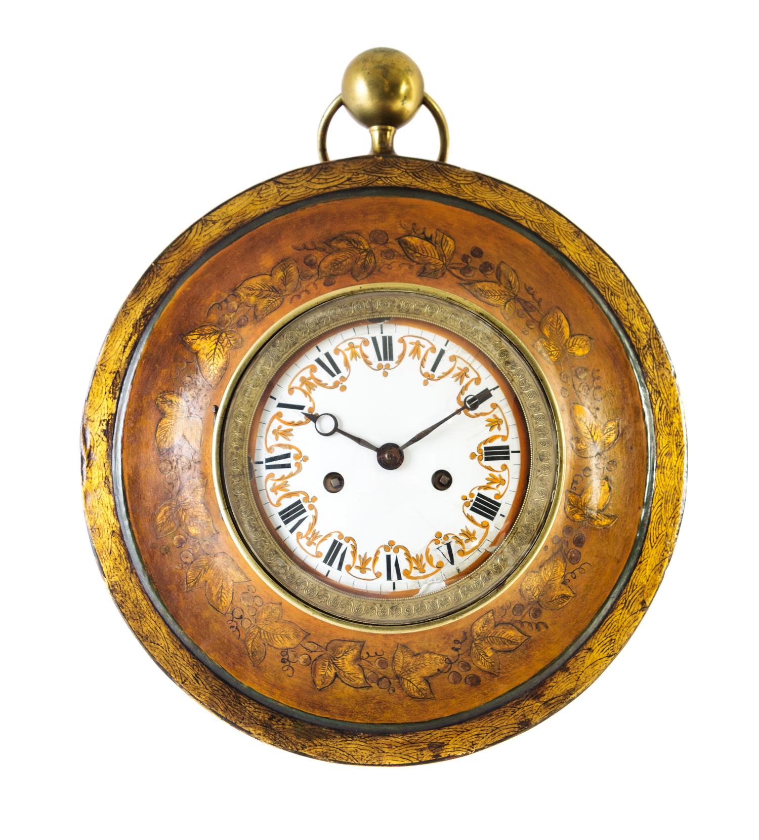 A Tole Wall Clock Height overall 19 inches. — 19TH/20TH CENTURY