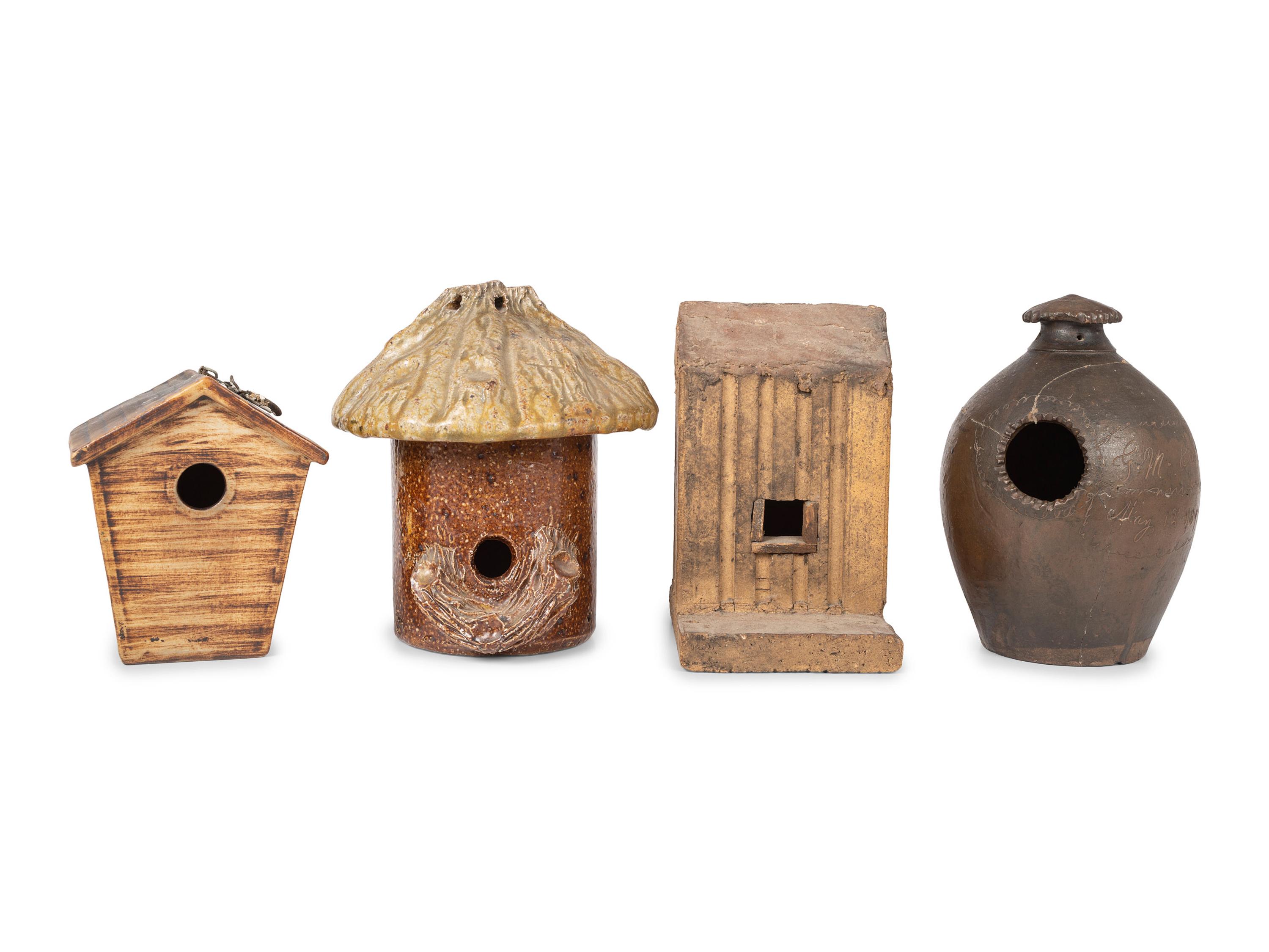Four Stoneware Birdhouses