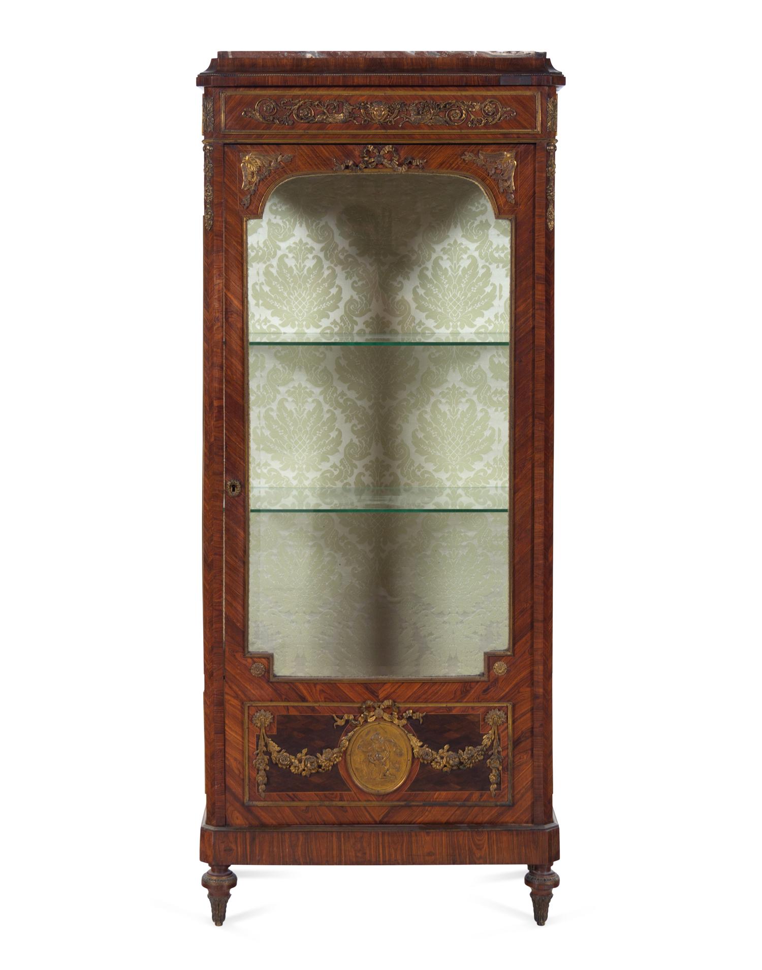 A Louis XVI Style Gilt Bronze Mounted Kingwood Vitrine Cabinet