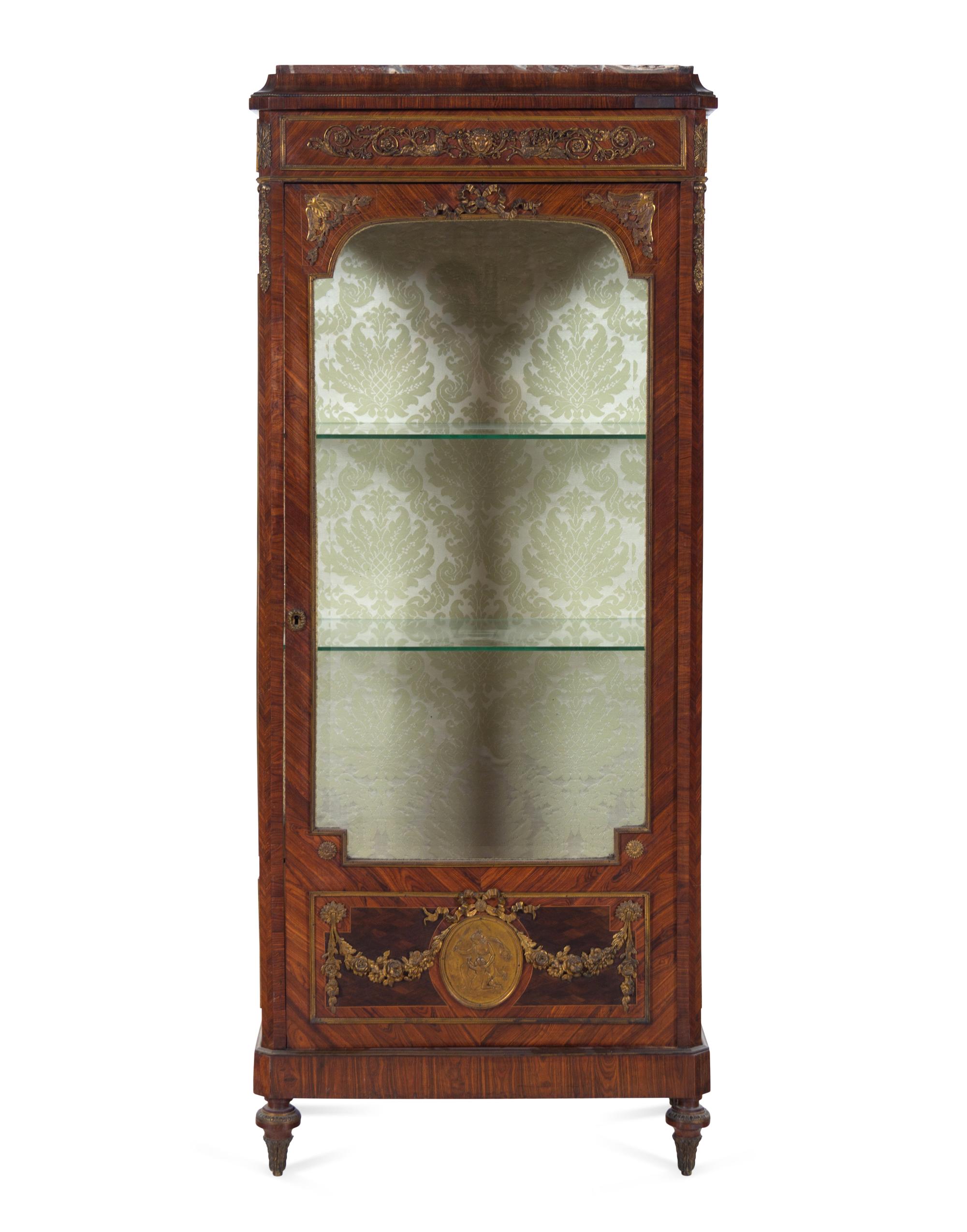 A Louis XVI Style Gilt Bronze Mounted Kingwood Vitrine Cabinet