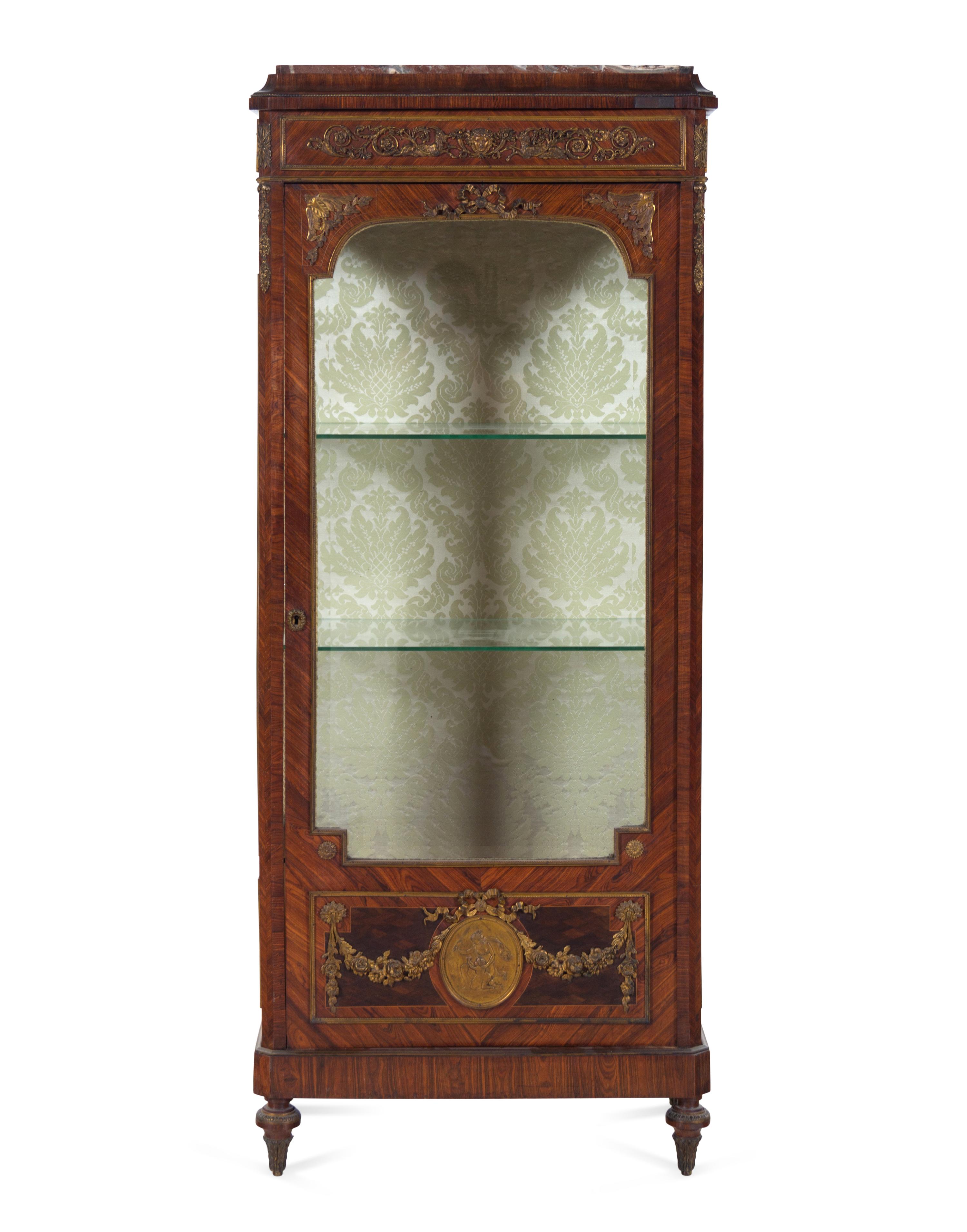 A Louis XVI Style Gilt Bronze Mounted Kingwood Vitrine Cabinet