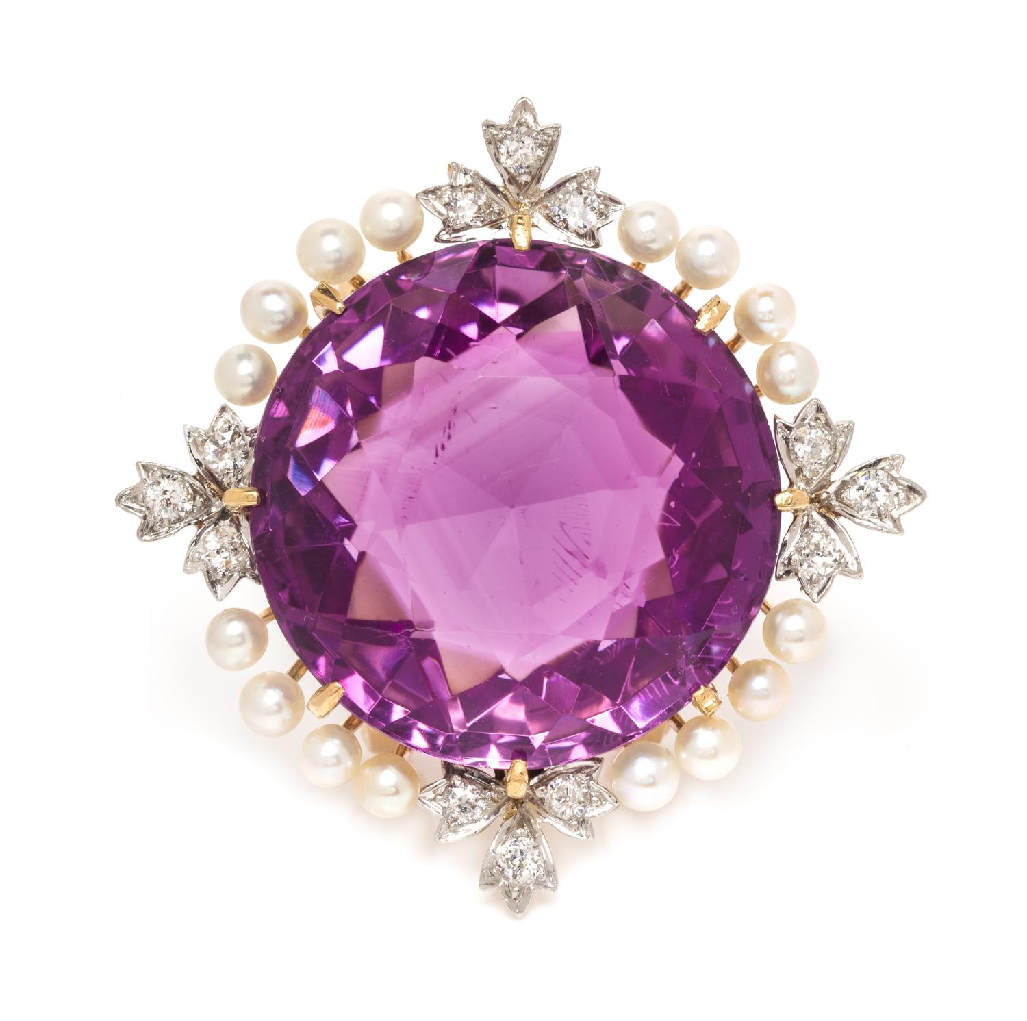 An Edwardian Platinum Topped Gold, Amethyst, Diamond and Seed Pearl Pendant/Brooch, 11.00 dwts.