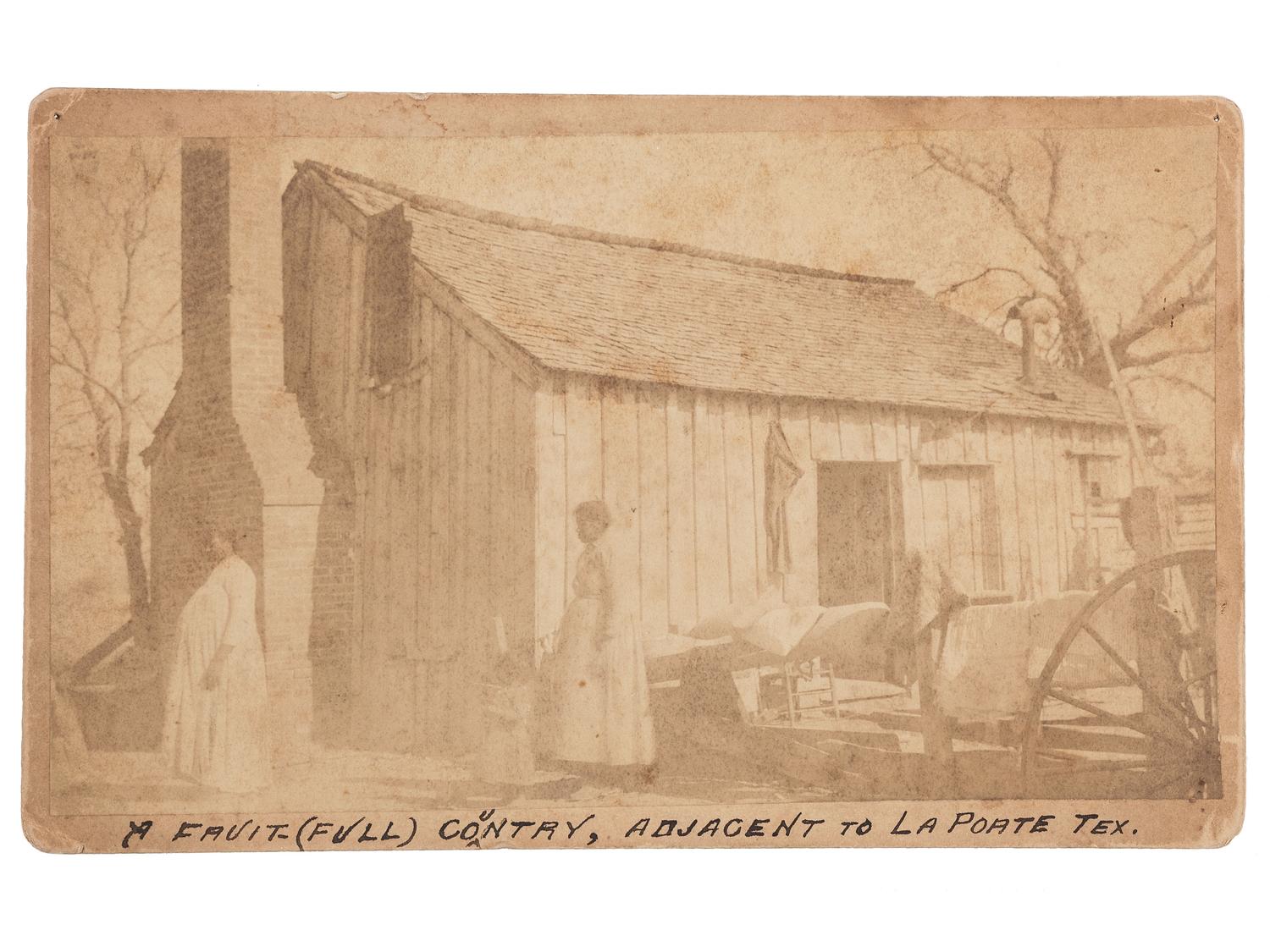 [EARLY PHOTOGRAPHY]. Irregular boudoir card of a pregnant African American woman outside of a home in Texas.