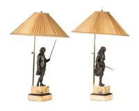 A Pair of French Bronze and Sienna Marble Sculptures of Voltaire and Rousseau