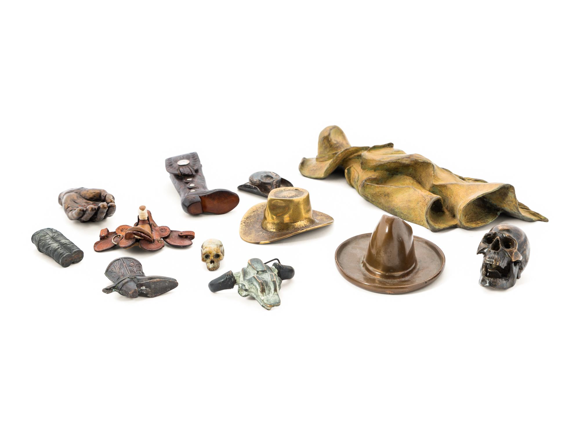 A Group of Eleven Miniature Bronze Western Objects