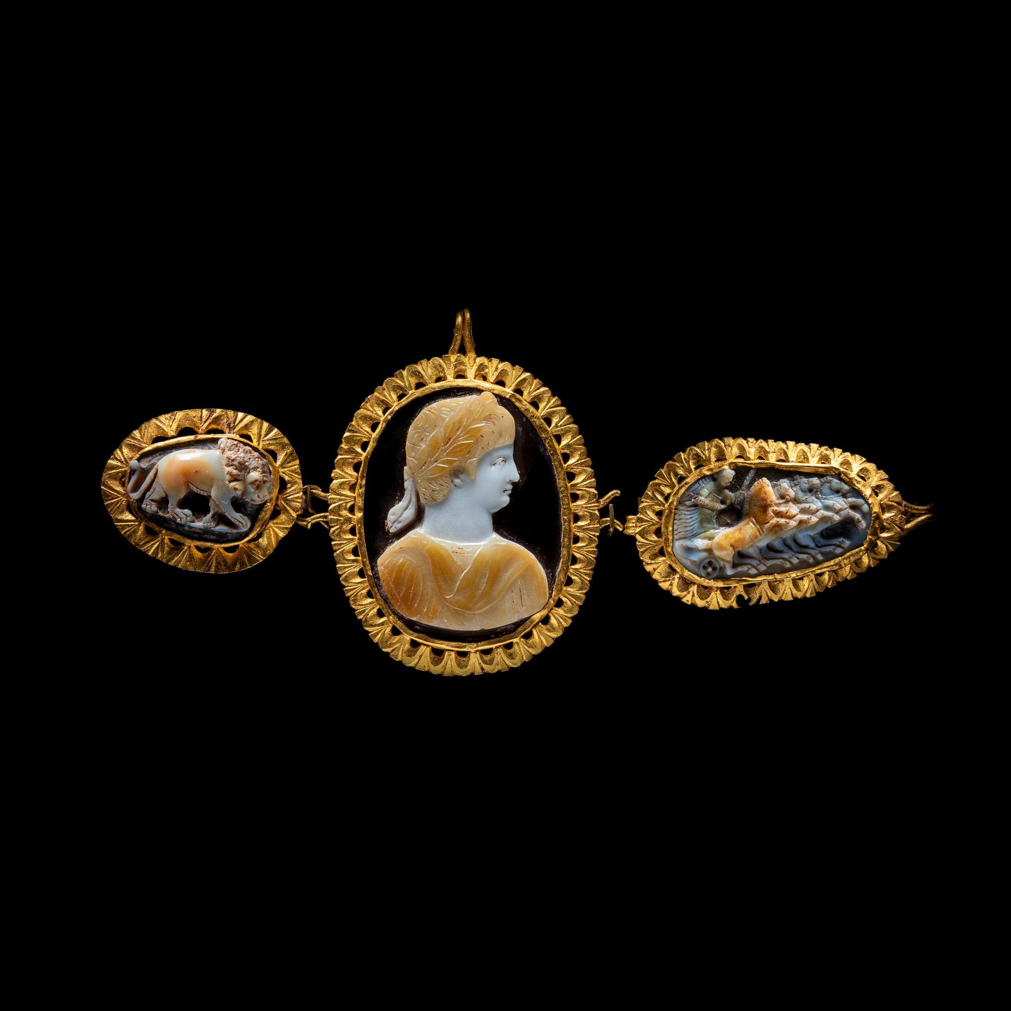 A Trio of Gold-mounted Sardonyx Cameos featuring Nero