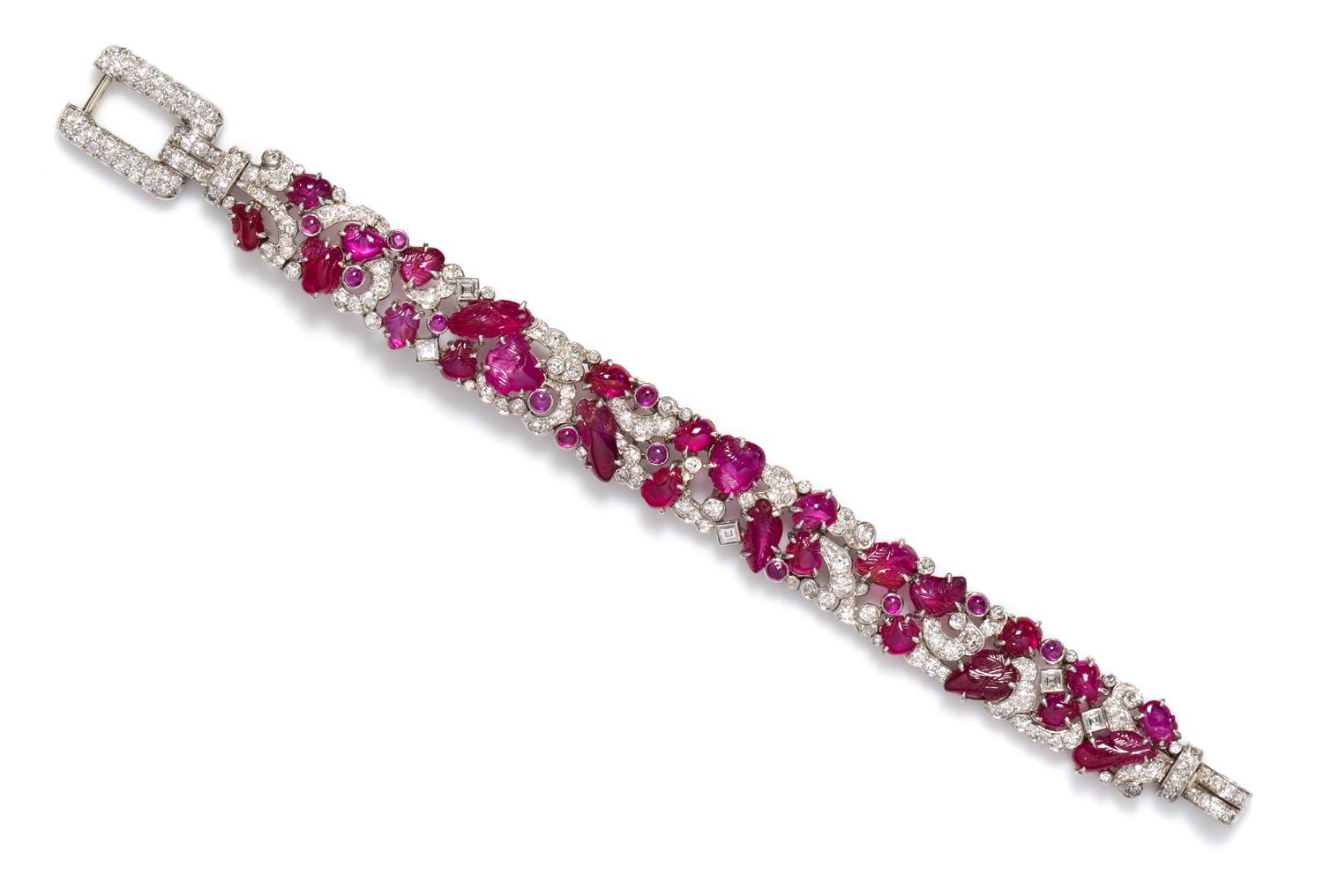 An Fine Art Deco Platinum, Diamond and Carved Ruby Bracelet, 30.80 dwts.