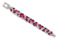 An Fine Art Deco Platinum, Diamond and Carved Ruby Bracelet, 30.80 dwts.
