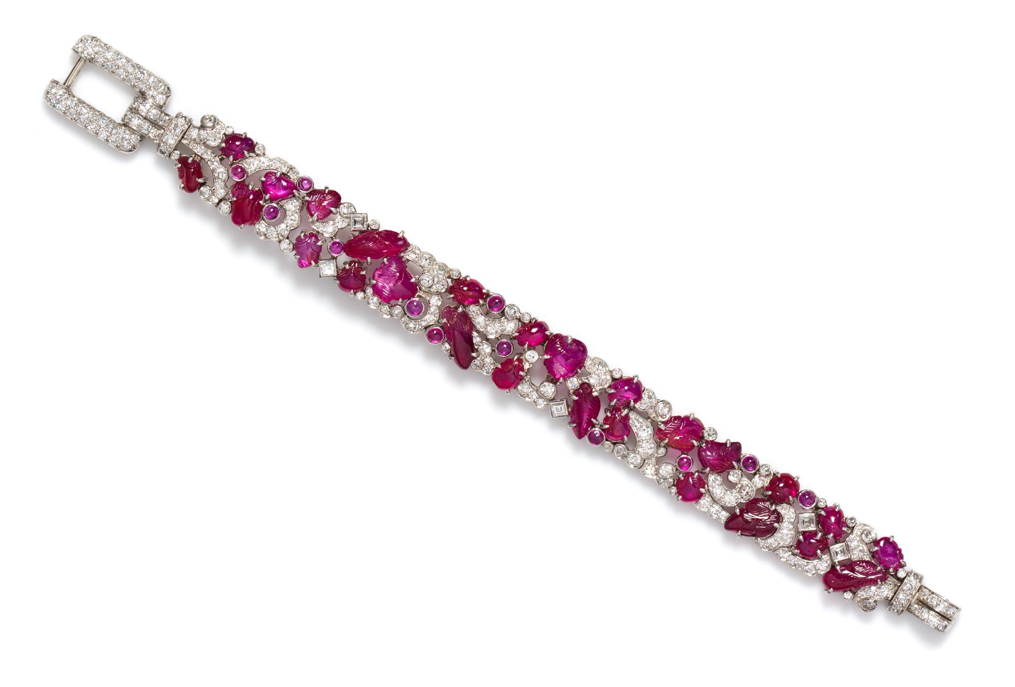An Fine Art Deco Platinum, Diamond and Carved Ruby Bracelet, 30.80 dwts.