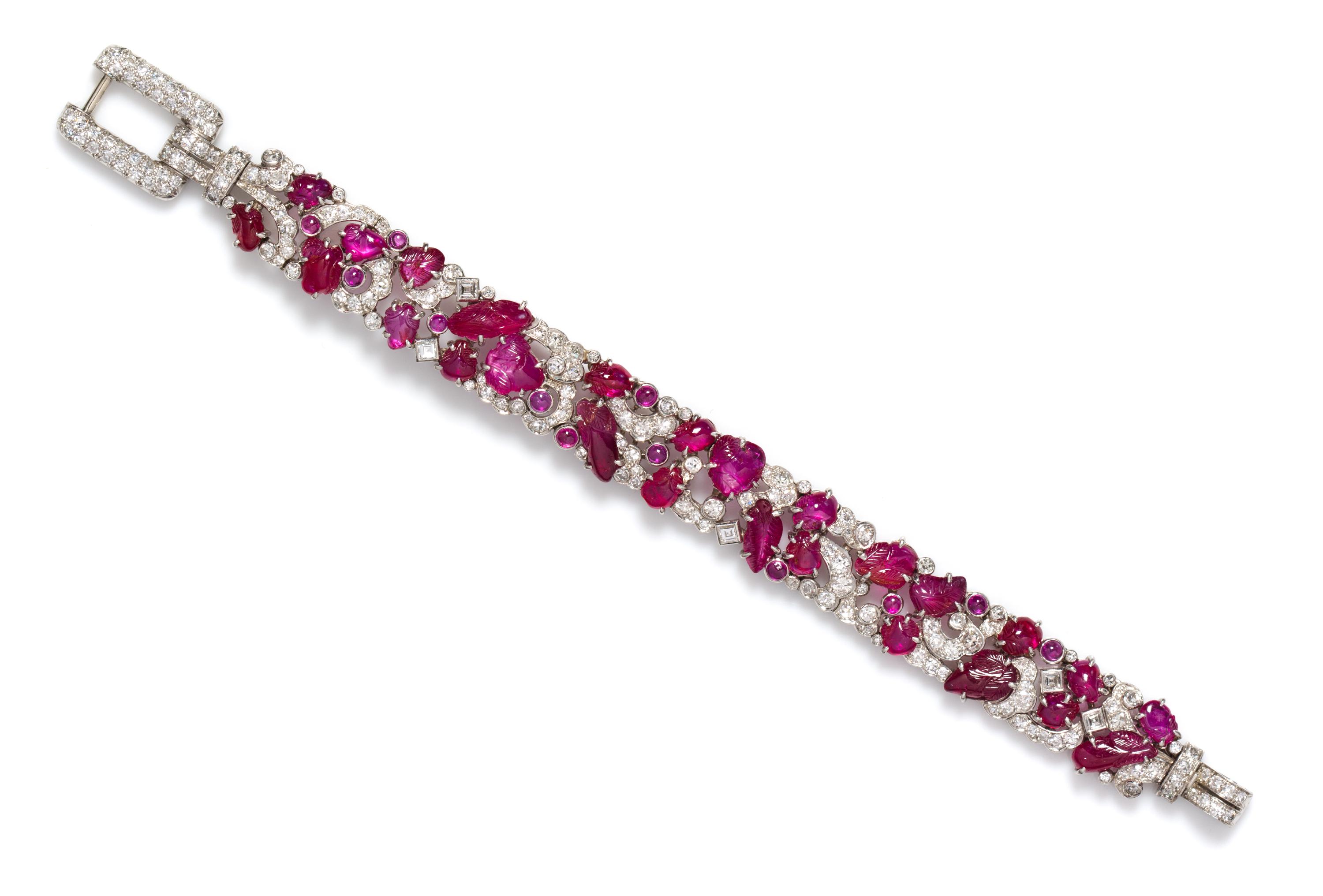 An Fine Art Deco Platinum, Diamond and Carved Ruby Bracelet, 30.80 dwts.