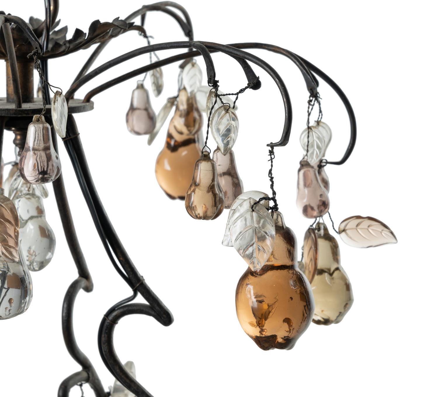 A Louis XV Style Iron and Glass Eight-Light Chandelier