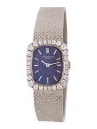 PATEK PHILIPPE, REF. 4102/1 18K WHITE GOLD AND DIAMOND 'ELLIPSE LADY' WRISTWATCH