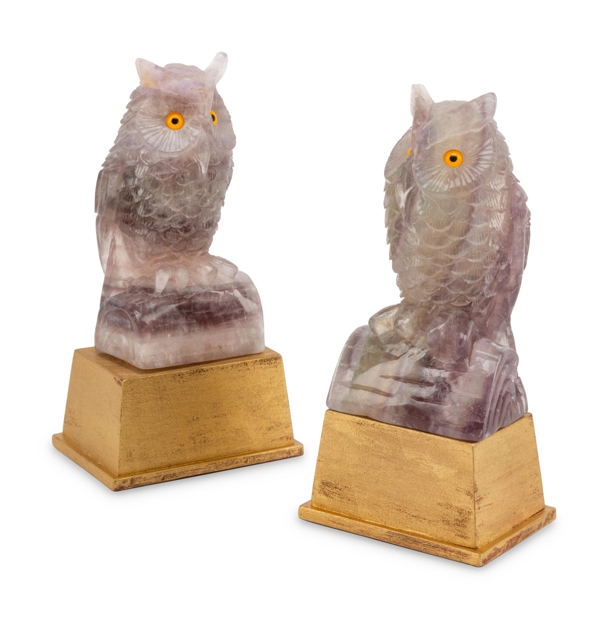 A Pair of Carved Amethyst Owls with Carved Wood Bases