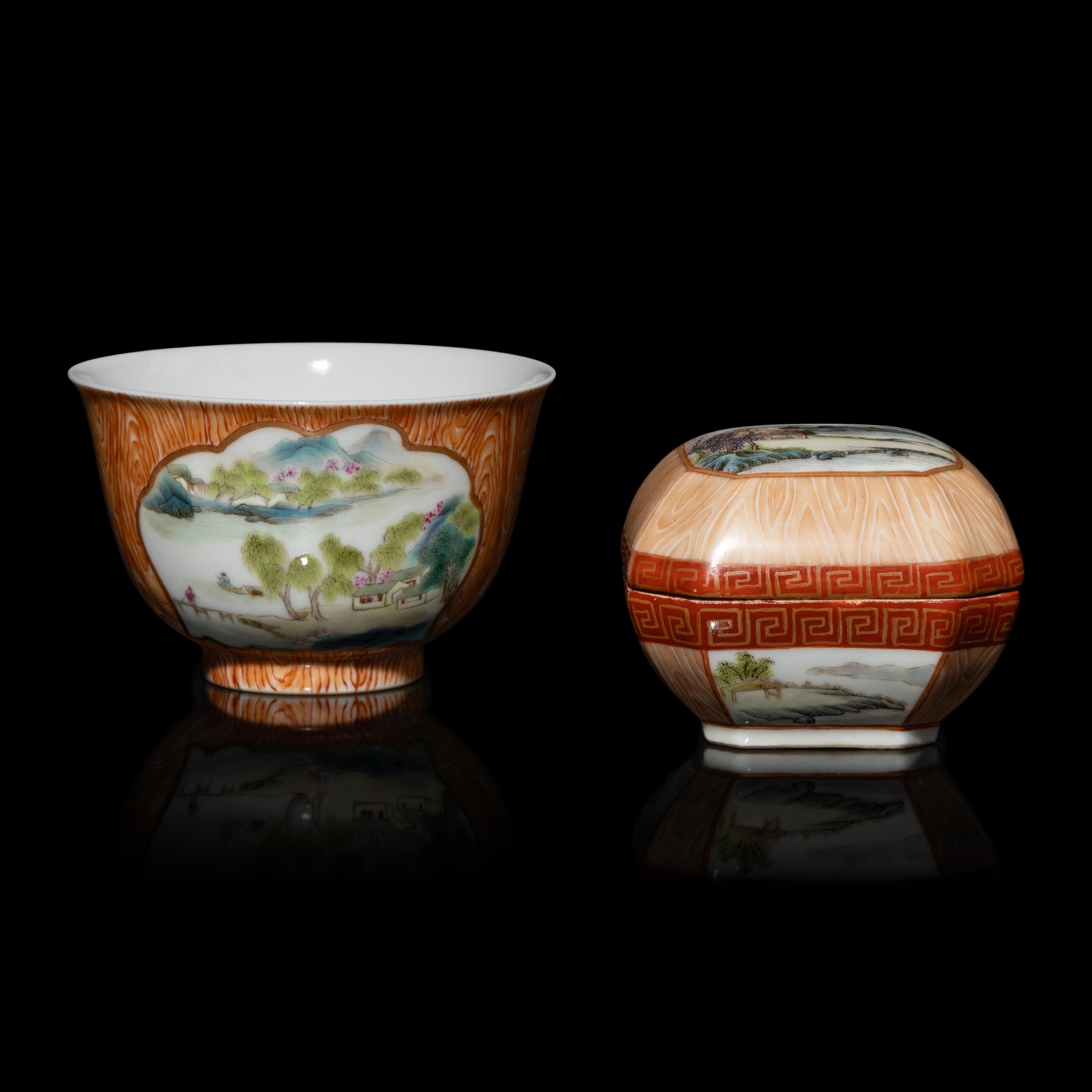 Two Chinese Faux-Bois and Famille Rose Porcelain Wares, Late 19th-Early 20th Century — 晚清-民國 粉彩仿木紋開光山水圖八方小蓋盒及茶杯