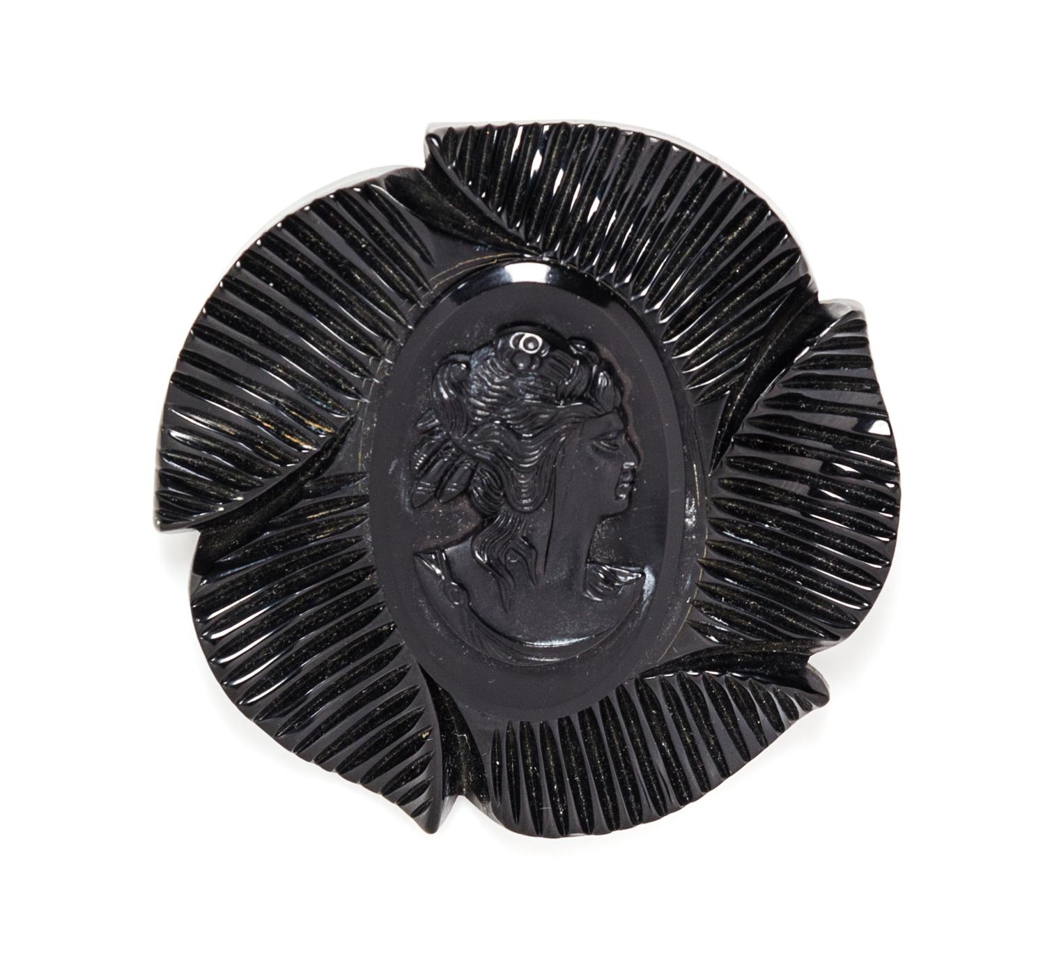 A Black Bakelite Cameo Brooch, 3"x 3".