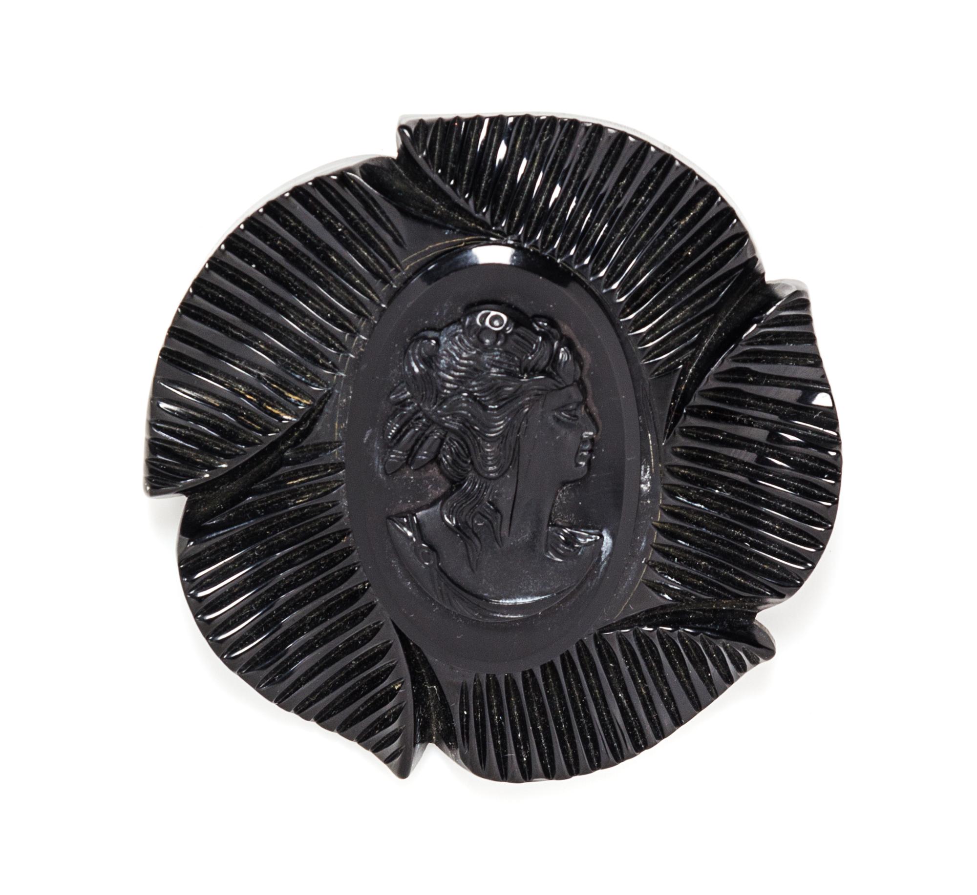 A Black Bakelite Cameo Brooch, 3"x 3".