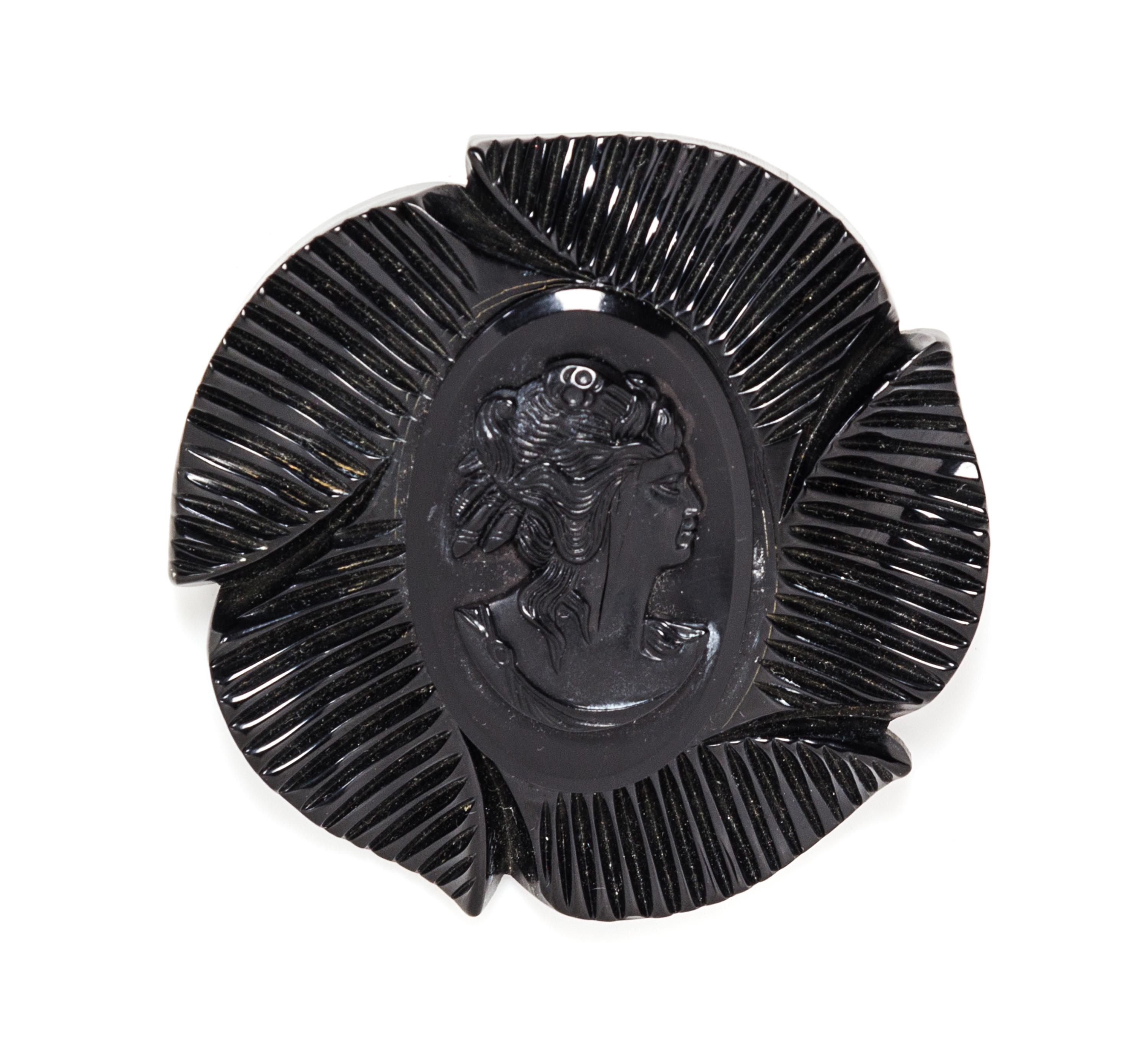 A Black Bakelite Cameo Brooch, 3"x 3".