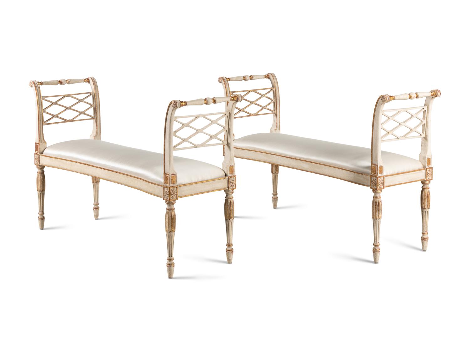 A Pair of George III Style Painted and Parcel-Gilt Window Benches