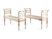 A Pair of George III Style Painted and Parcel-Gilt Window Benches