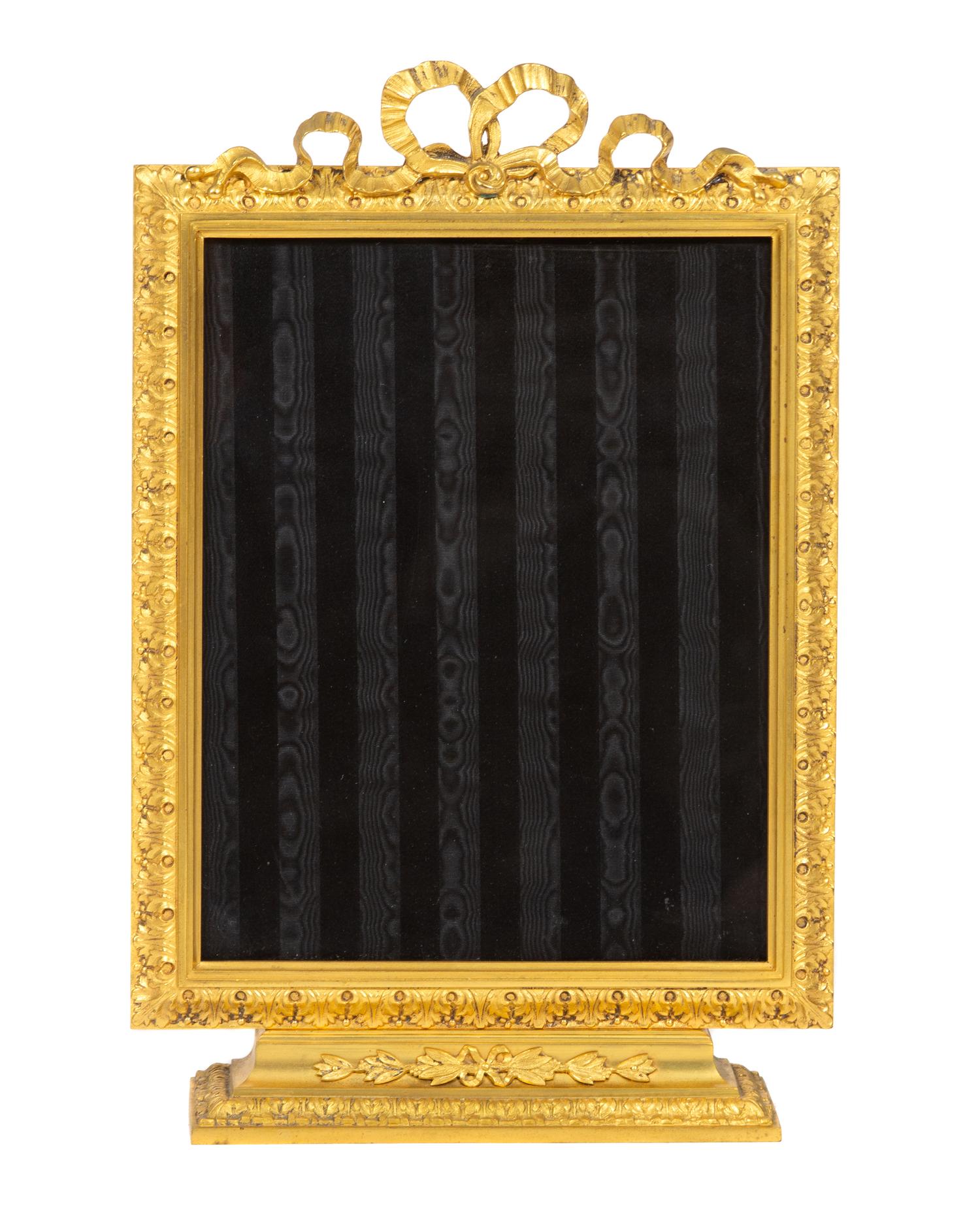 A French Gilt Bronze Pedestal Base Picture Frame Height 13 1/4 x width 8 3/4 inches. — EARLY 20TH CENTURY