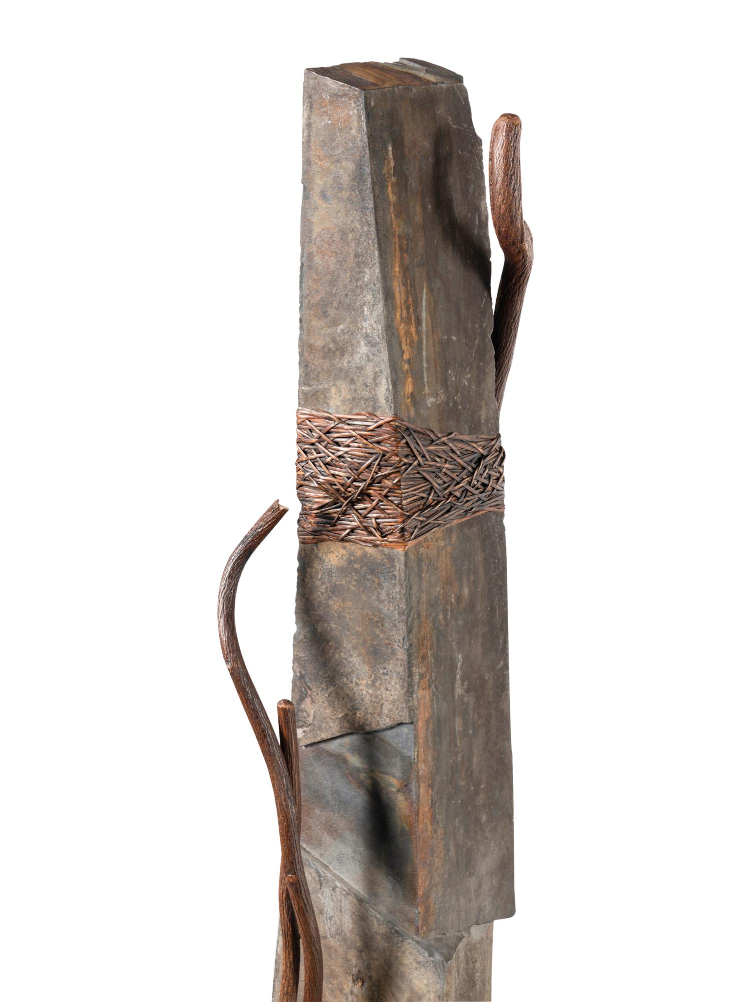 A Contemporary Stone and Rattan Sculpture