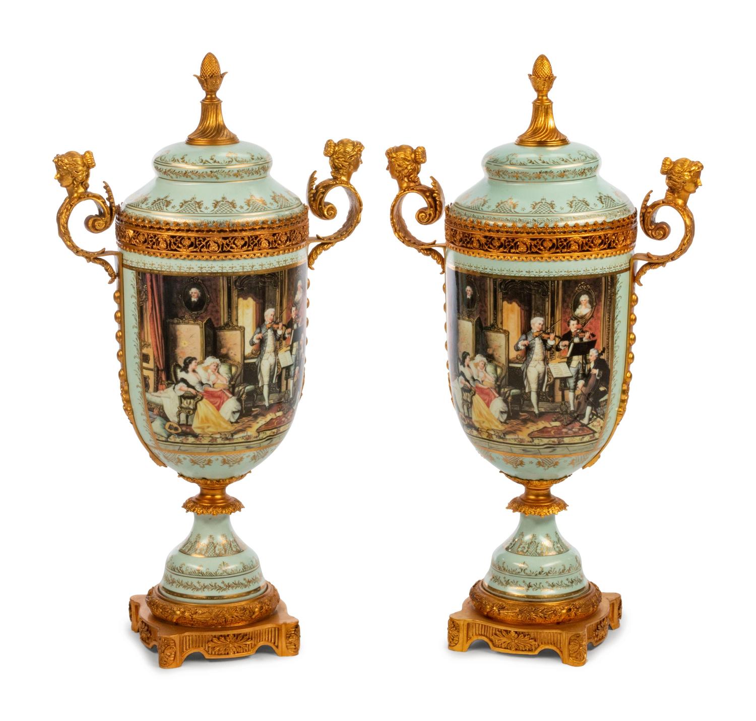 A Pair of Gilt Metal Mounted Sèvres Style Porcelain Covered Vases