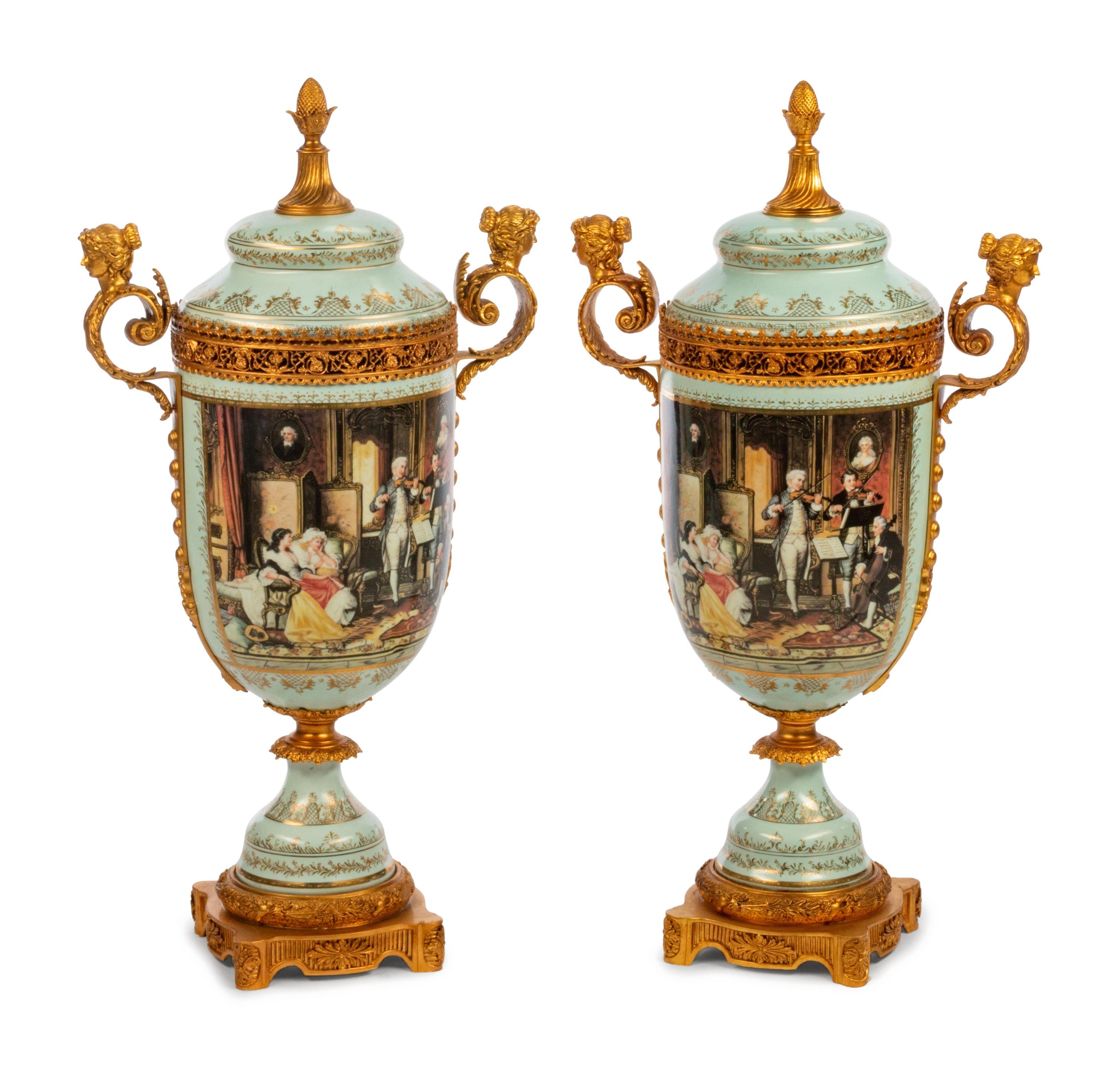 A Pair of Gilt Metal Mounted Sèvres Style Porcelain Covered Vases