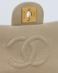 A Chanel Cream Calfskin Leather Small Flap Handbag, 6.5" x 5.5" x 2.5".