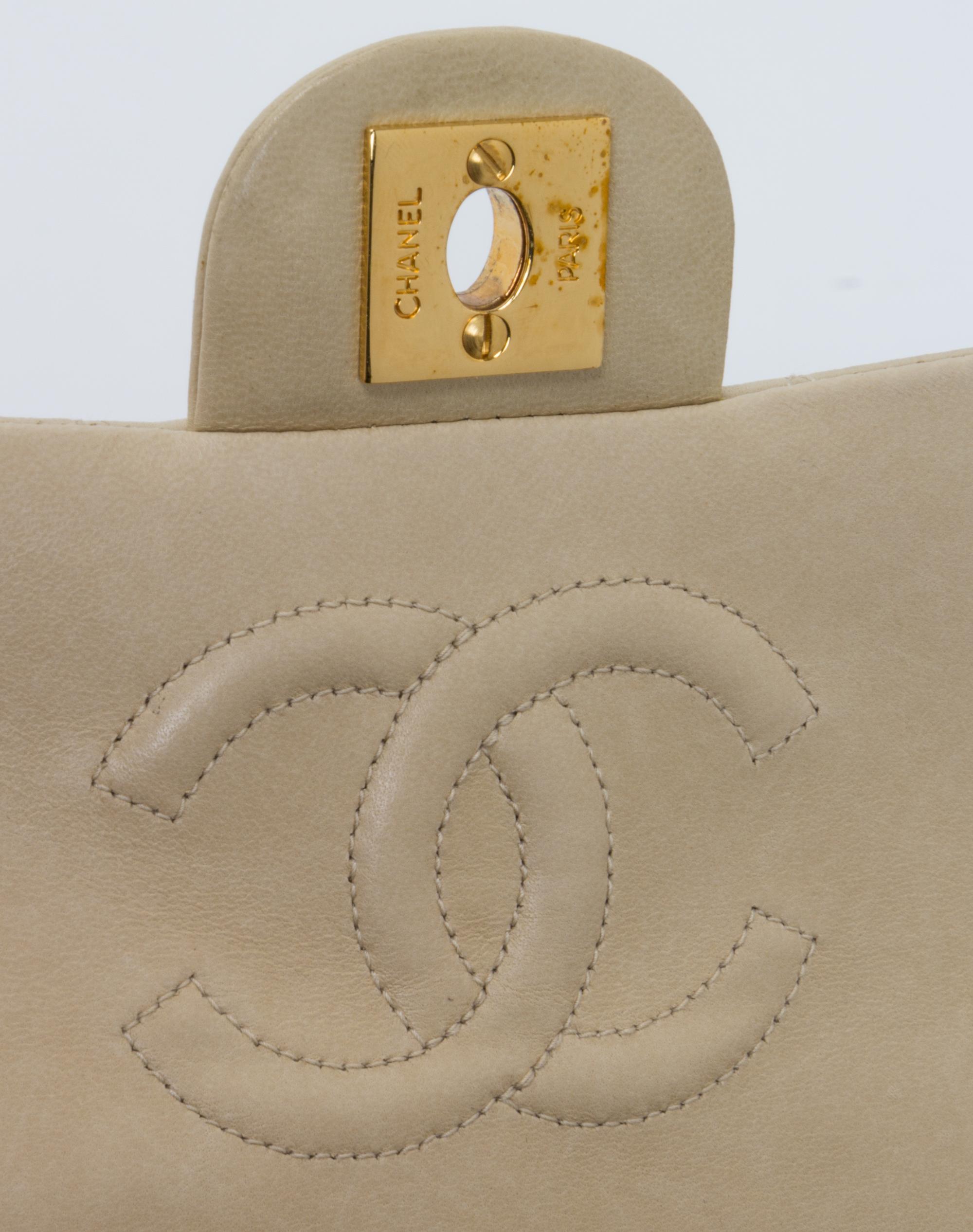 A Chanel Cream Calfskin Leather Small Flap Handbag, 6.5" x 5.5" x 2.5".